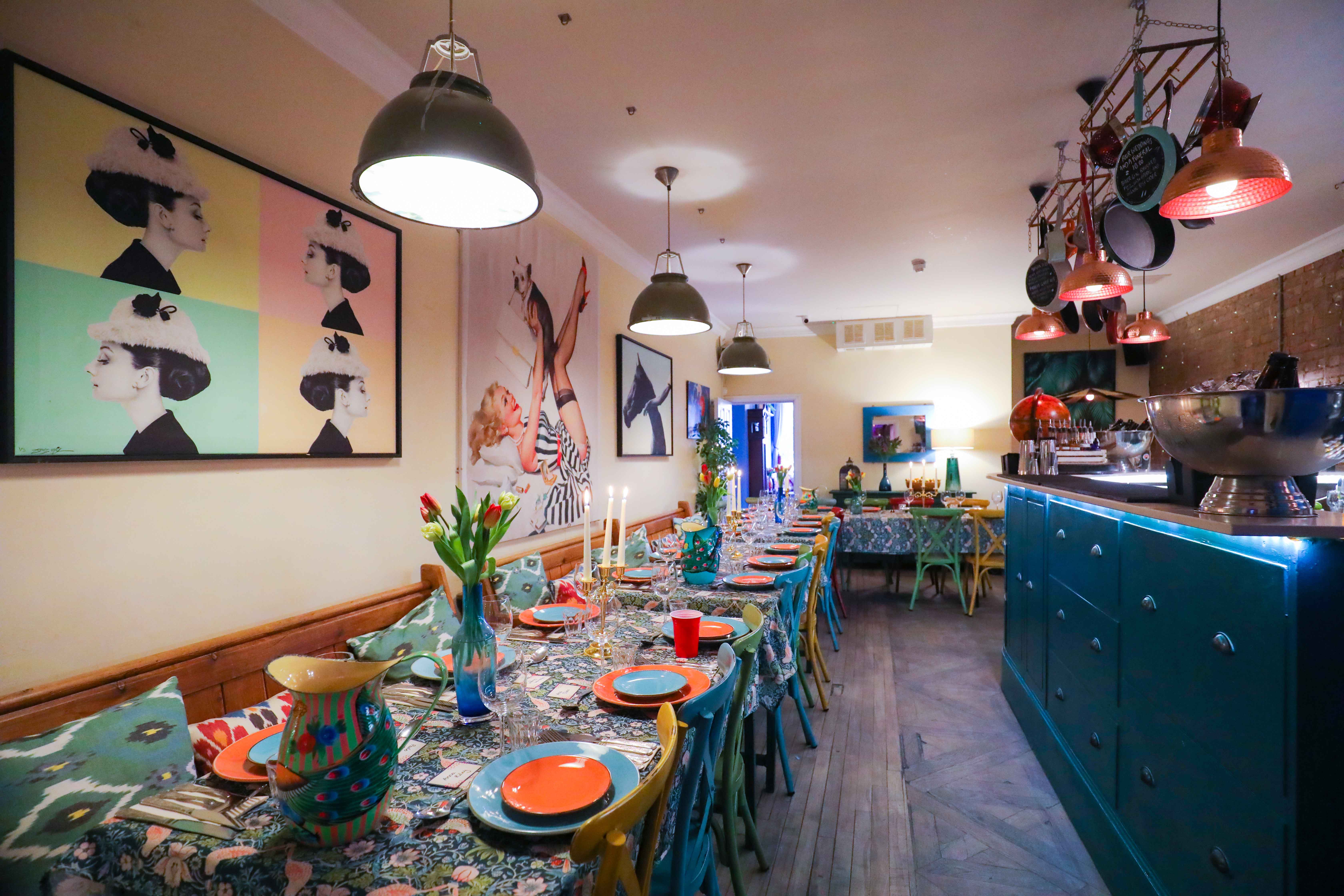 Vibrant dining space at The Little Blue Door, perfect for themed dinners and private events.
