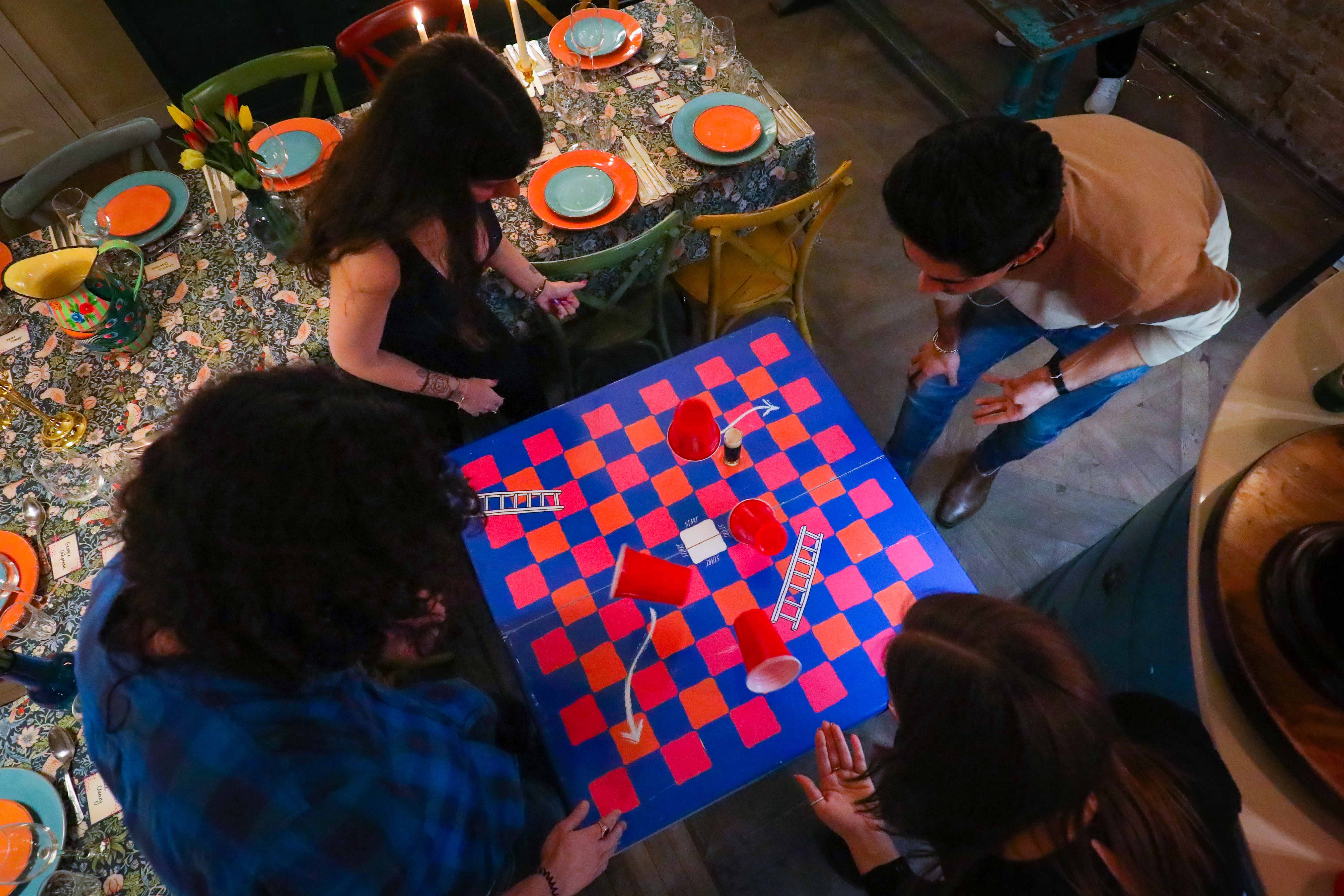 Vibrant kitchen setup with colorful table for casual team-building events and networking.
