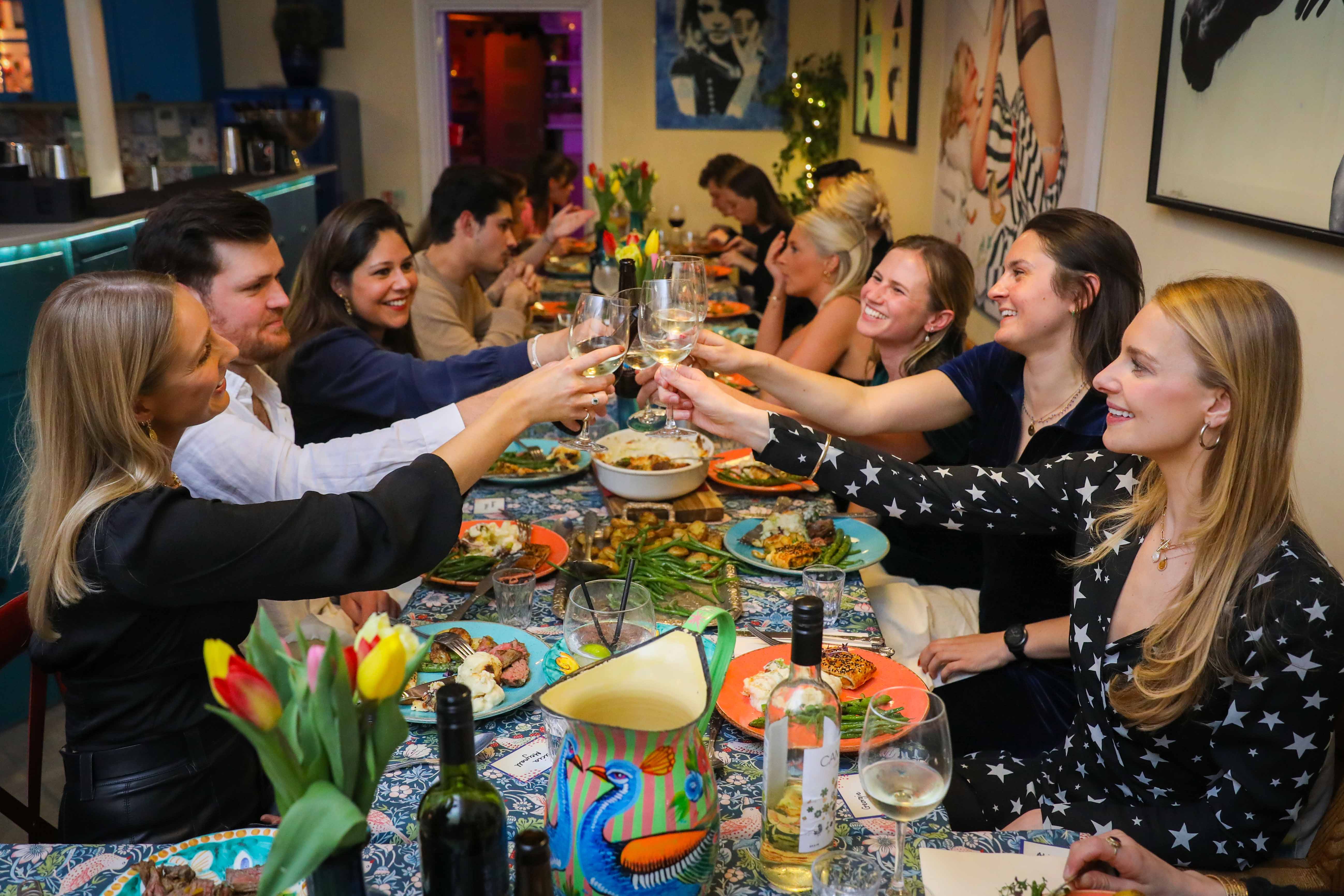 Vibrant dinner gathering at The Kitchen, enhancing networking and engagement through social dining.