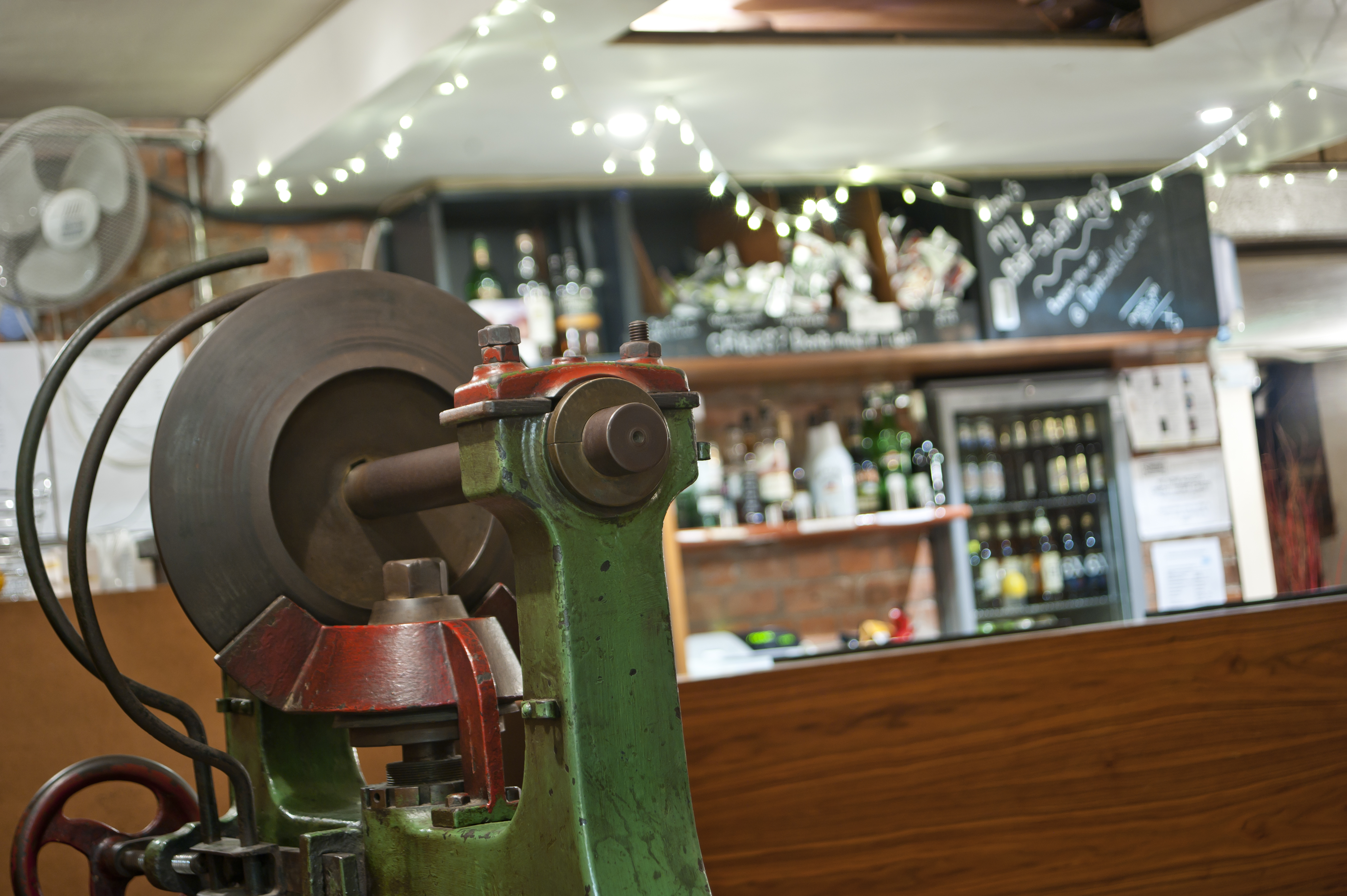 Theatre Bar at St Bride Foundation with vintage machine, ideal for events and gatherings.