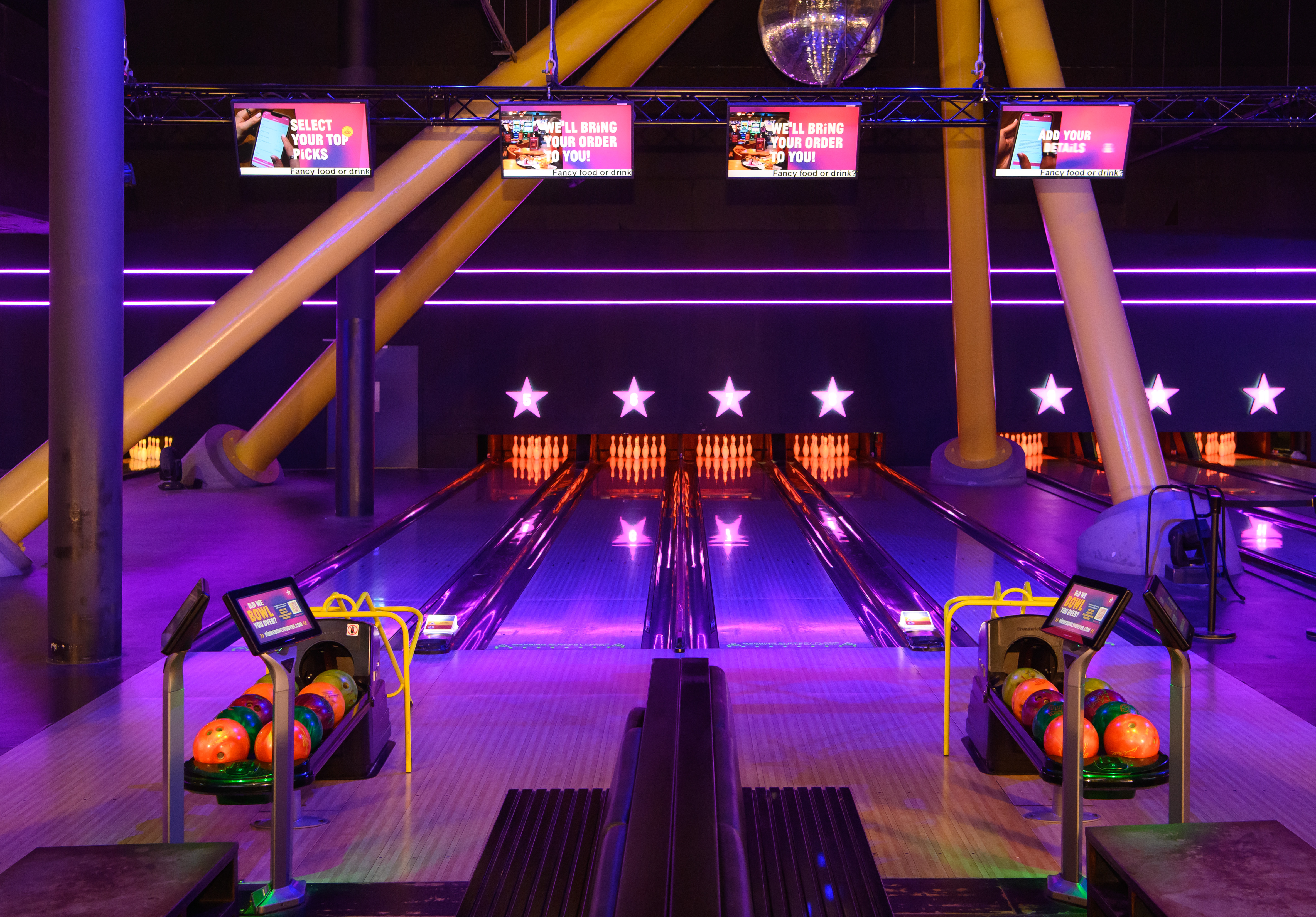Vibrant bowling alley at Hollywood Bowl O2, ideal for corporate events and team-building.