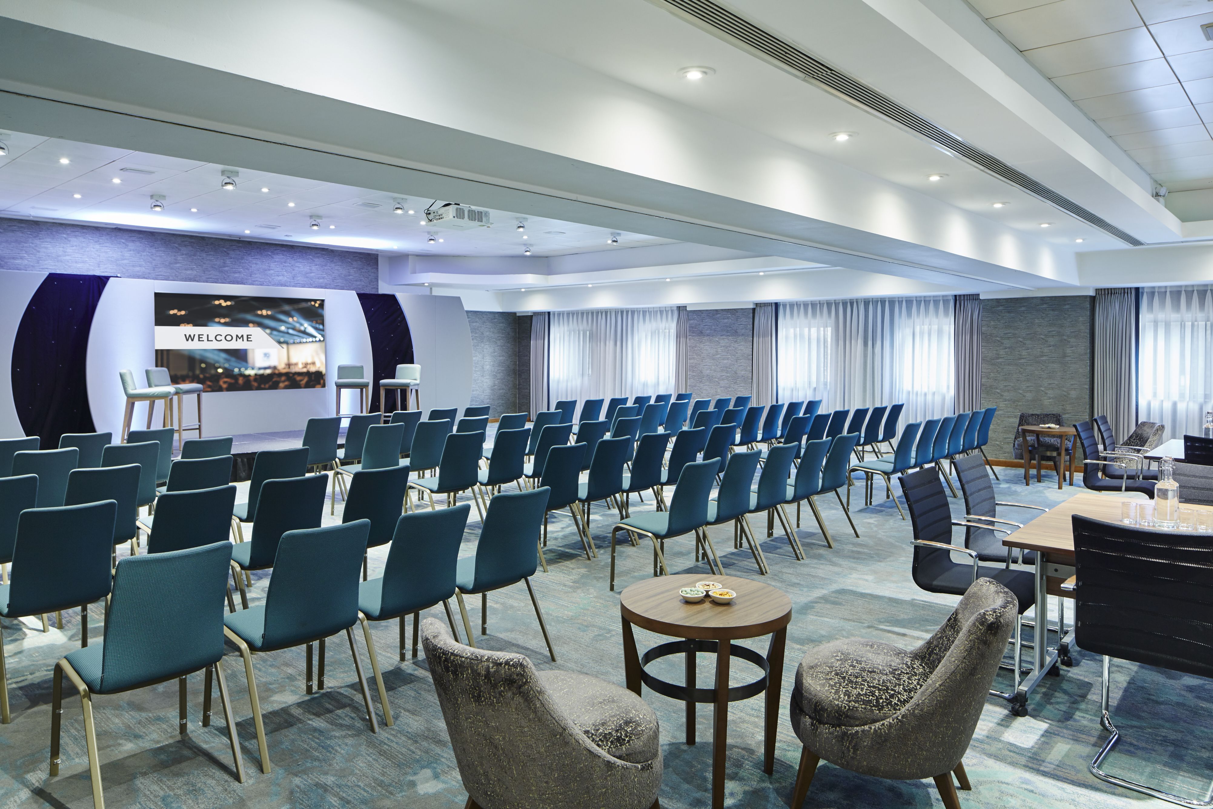 Cheshire Suite at Delta Hotels: modern meeting space for presentations and networking.