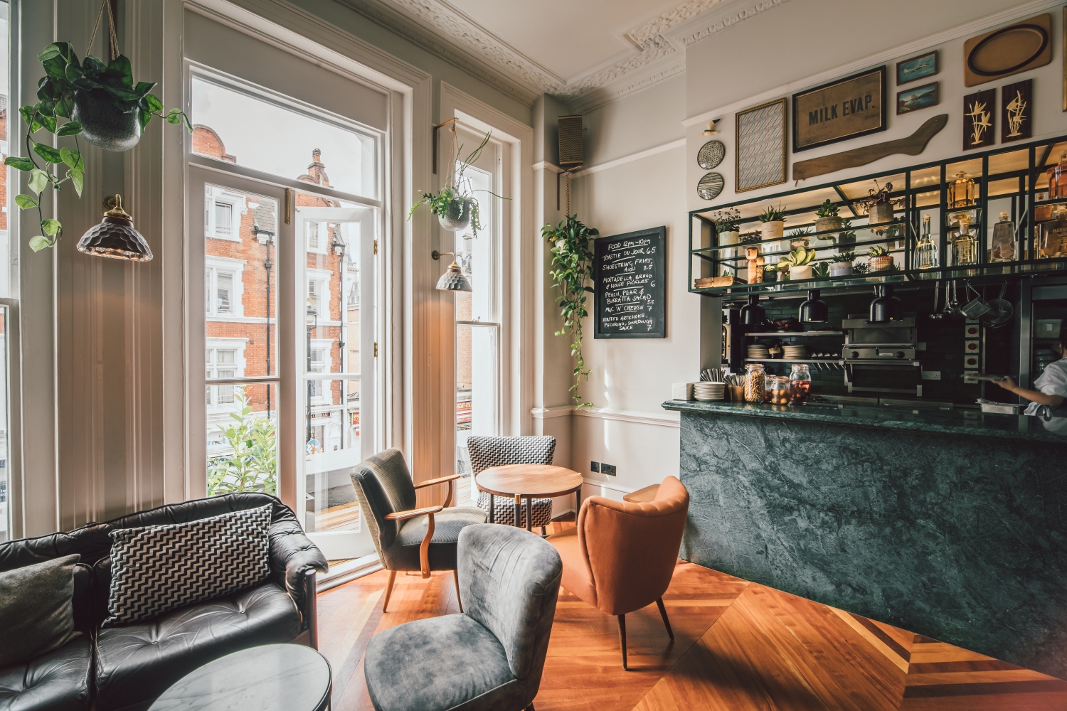 Lounge & Terrace at THE PILGRM, stylish café with natural light for networking events.