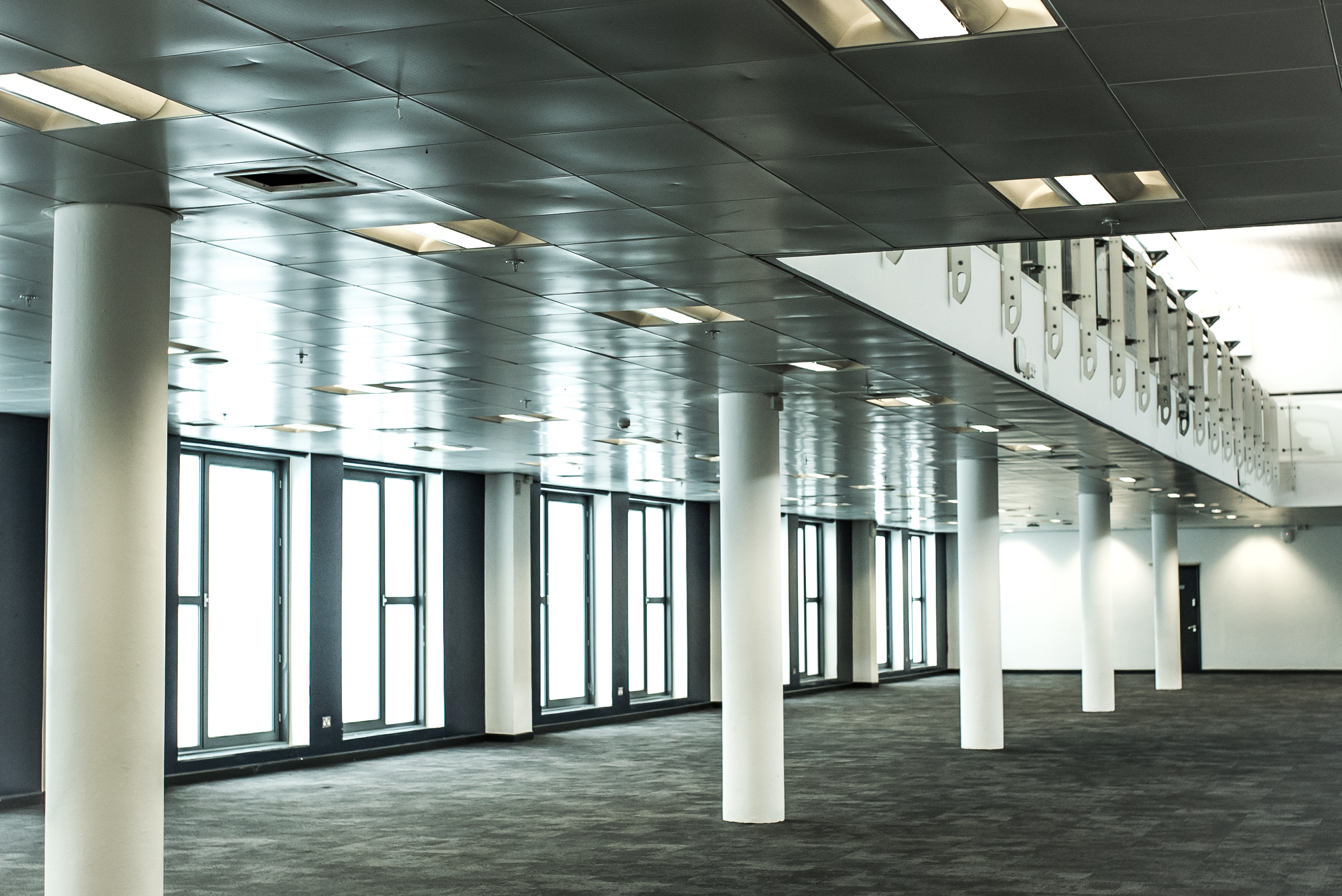 Spacious modern event space with high ceilings at Business Design Centre for conferences.
