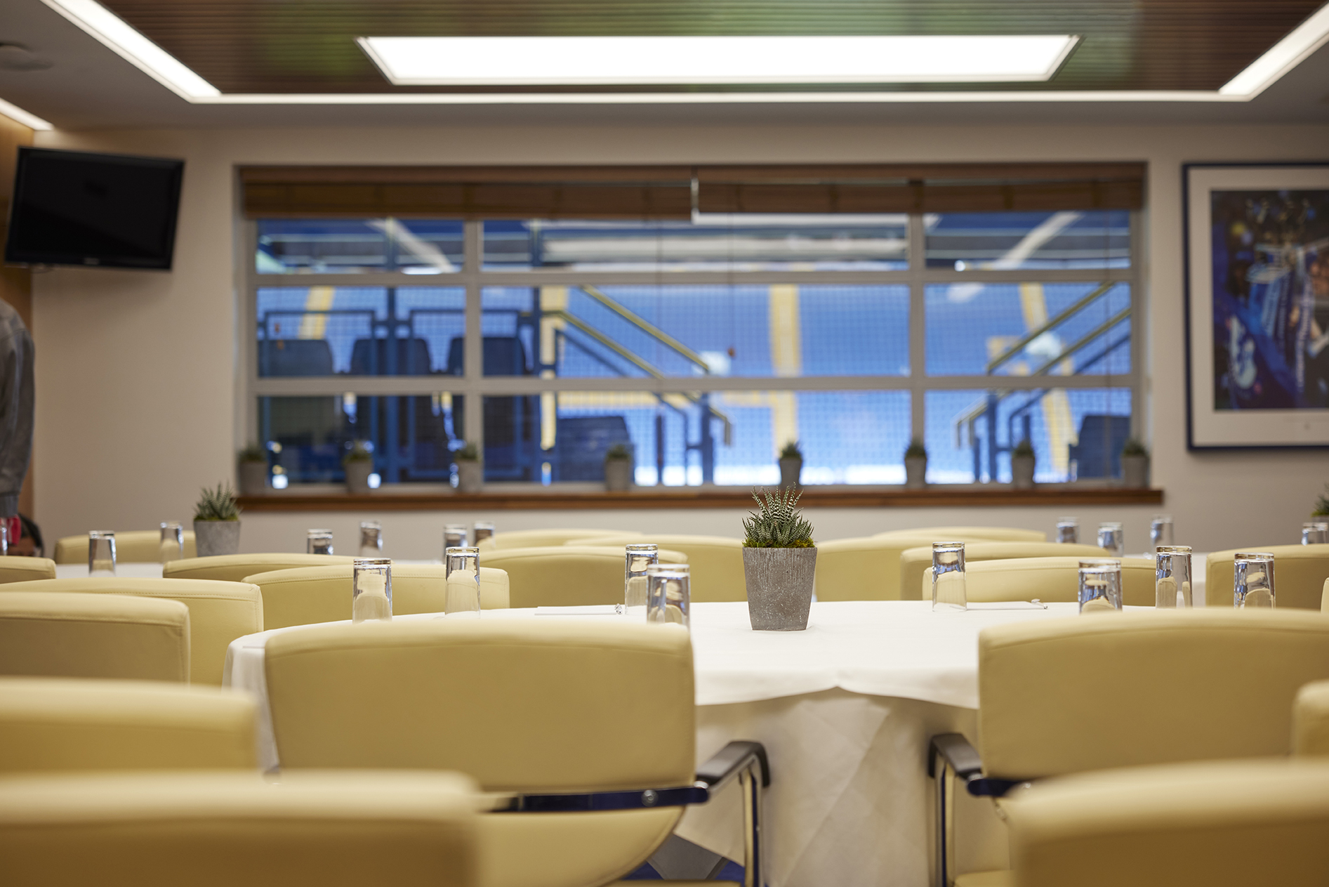 Vialli Suite at Chelsea FC: elegant meeting room with natural light for professional events.