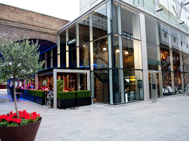 Chinese New Year party at Ping Pong Southbank, featuring a sleek glass venue and outdoor seating.
