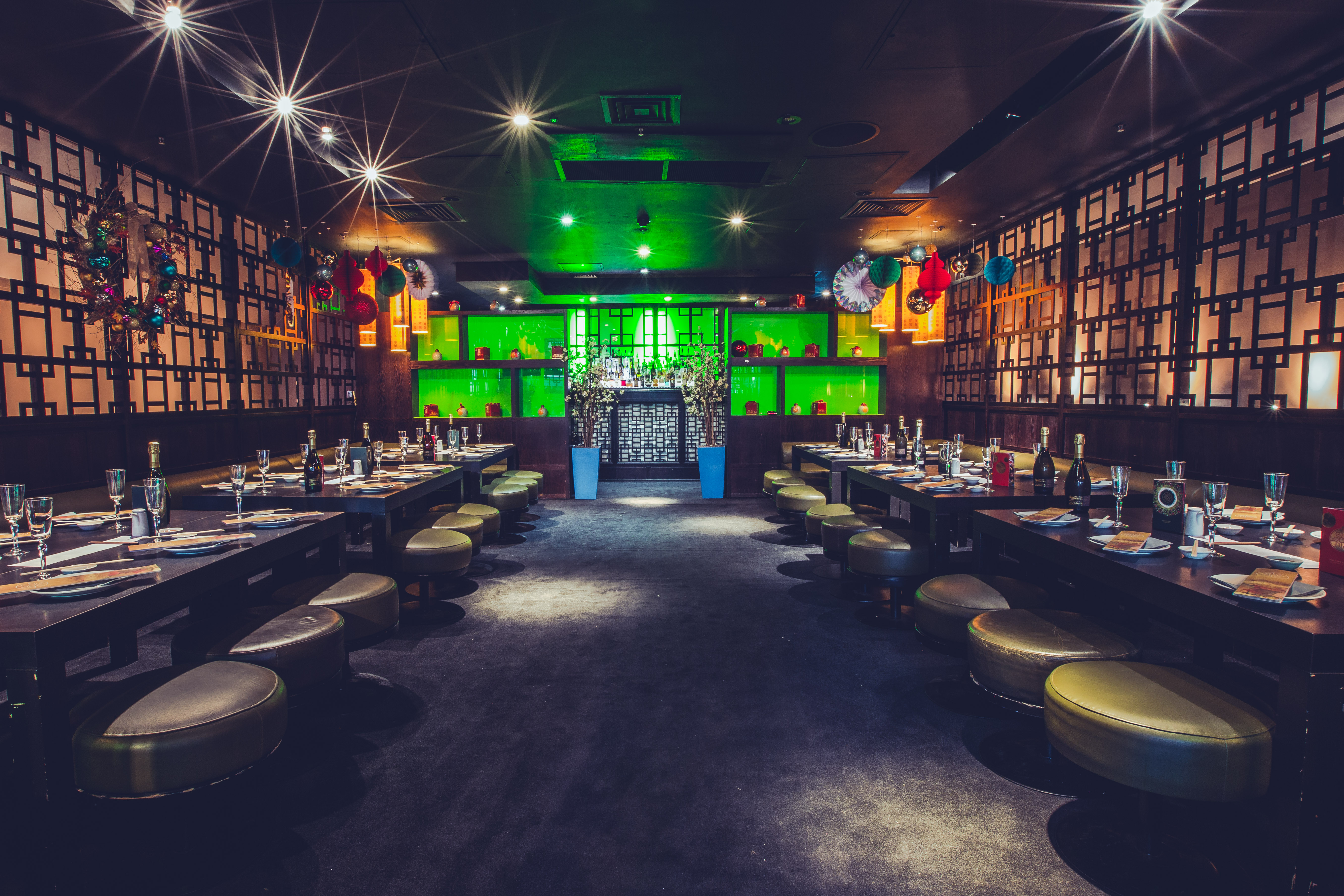 Stylish dining space for Chinese New Year parties with elegant tableware and vibrant decor.