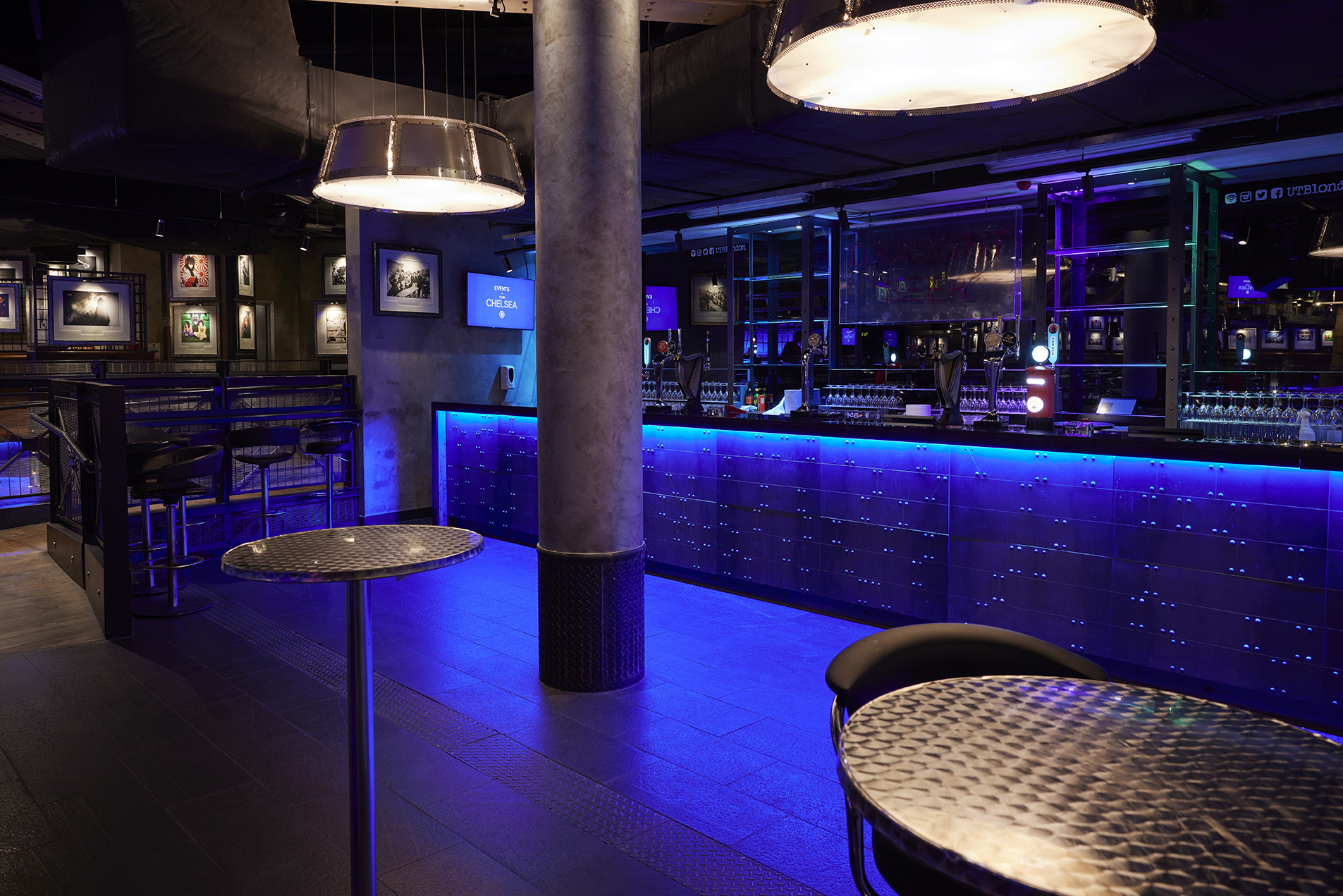 Modern event space at Chelsea FC with sleek bar, ideal for networking and cocktail events.