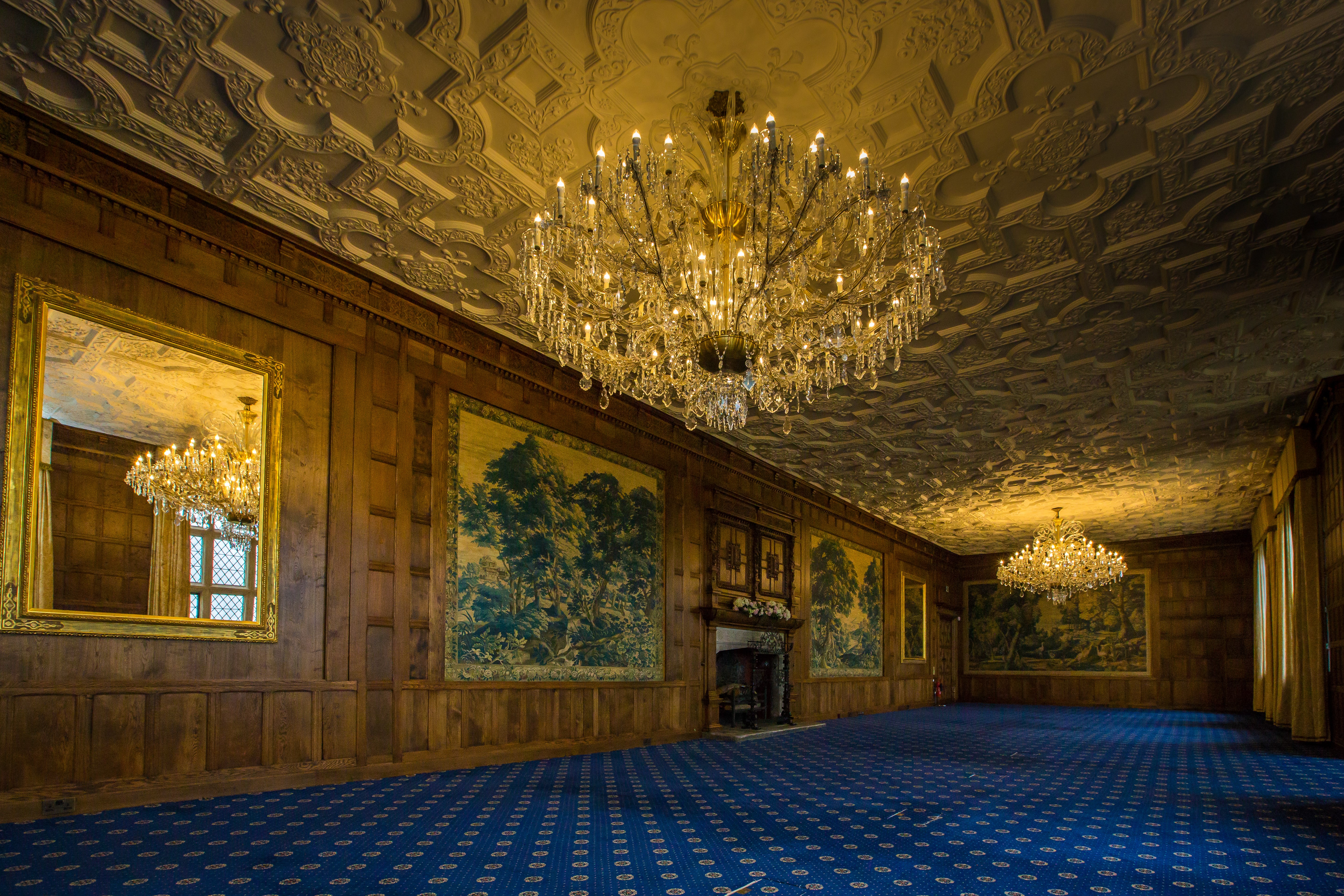 Elegant Mansion House event space with chandeliers, ideal for corporate gatherings.