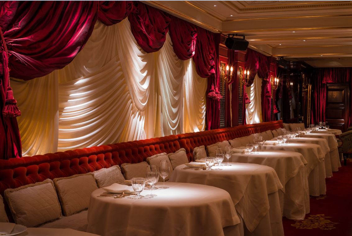 Elegant event space at Salon De Chine, plush seating for upscale gatherings and dinners.