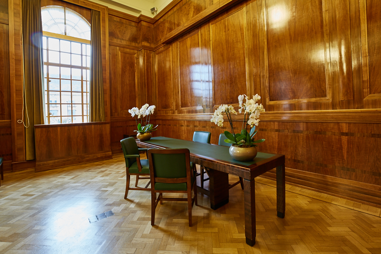 Hackney Town Hall Committee Room with wooden paneling, ideal for meetings and events.