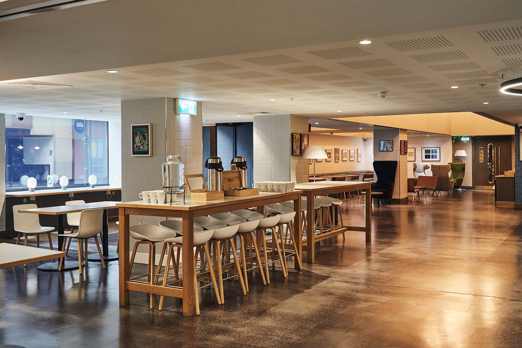 Modern event space at Barbican Centre with sleek bar, ideal for networking and receptions.