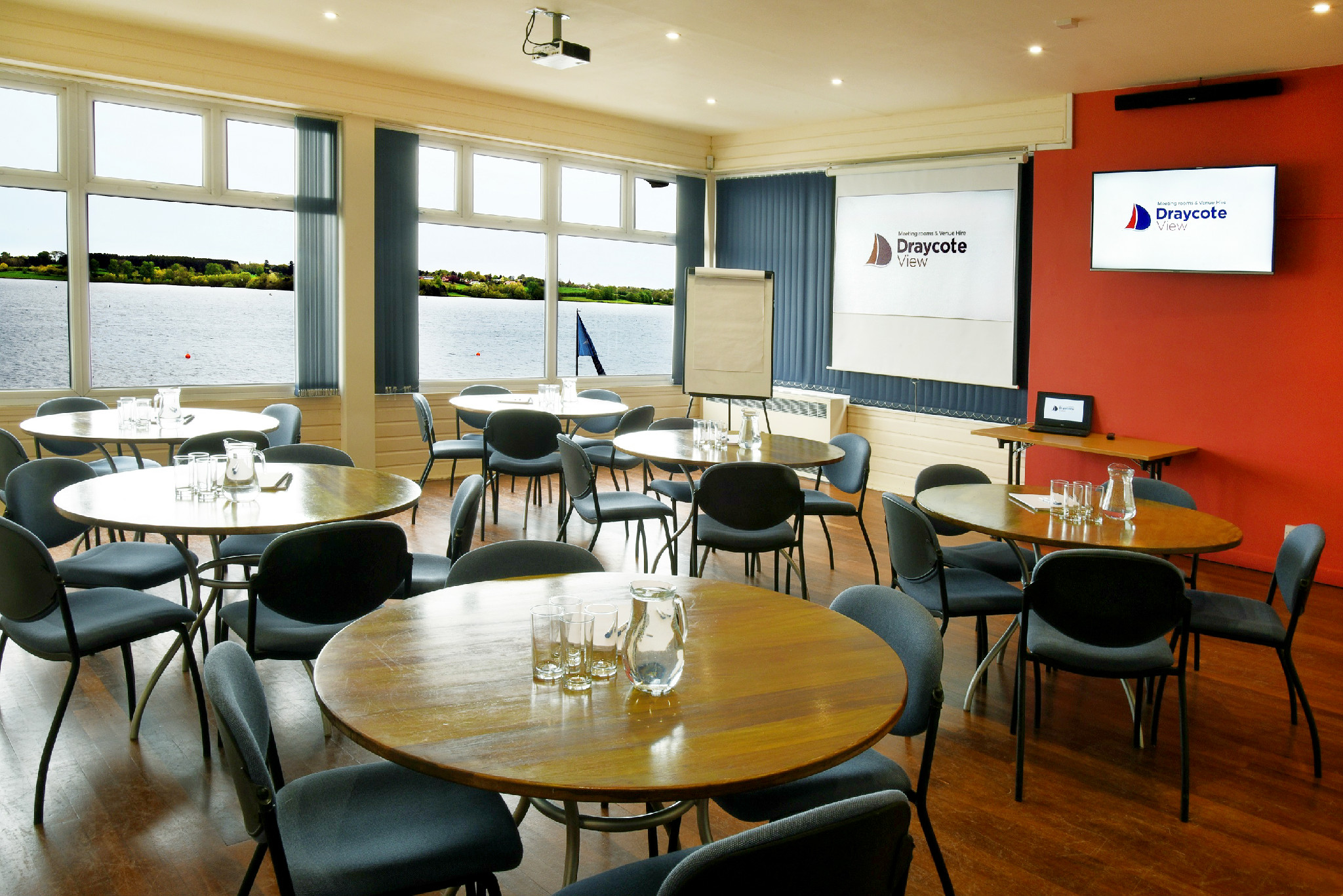 Draycote Lounge meeting room with waterfront view, ideal for corporate events and workshops.