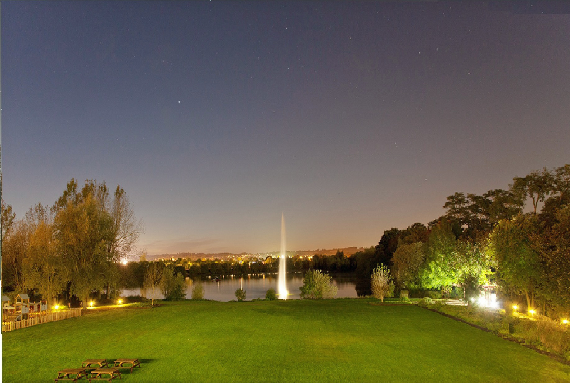 Riverside 4 venue at Crowne Plaza Marlow, serene lawn and lake for evening receptions.