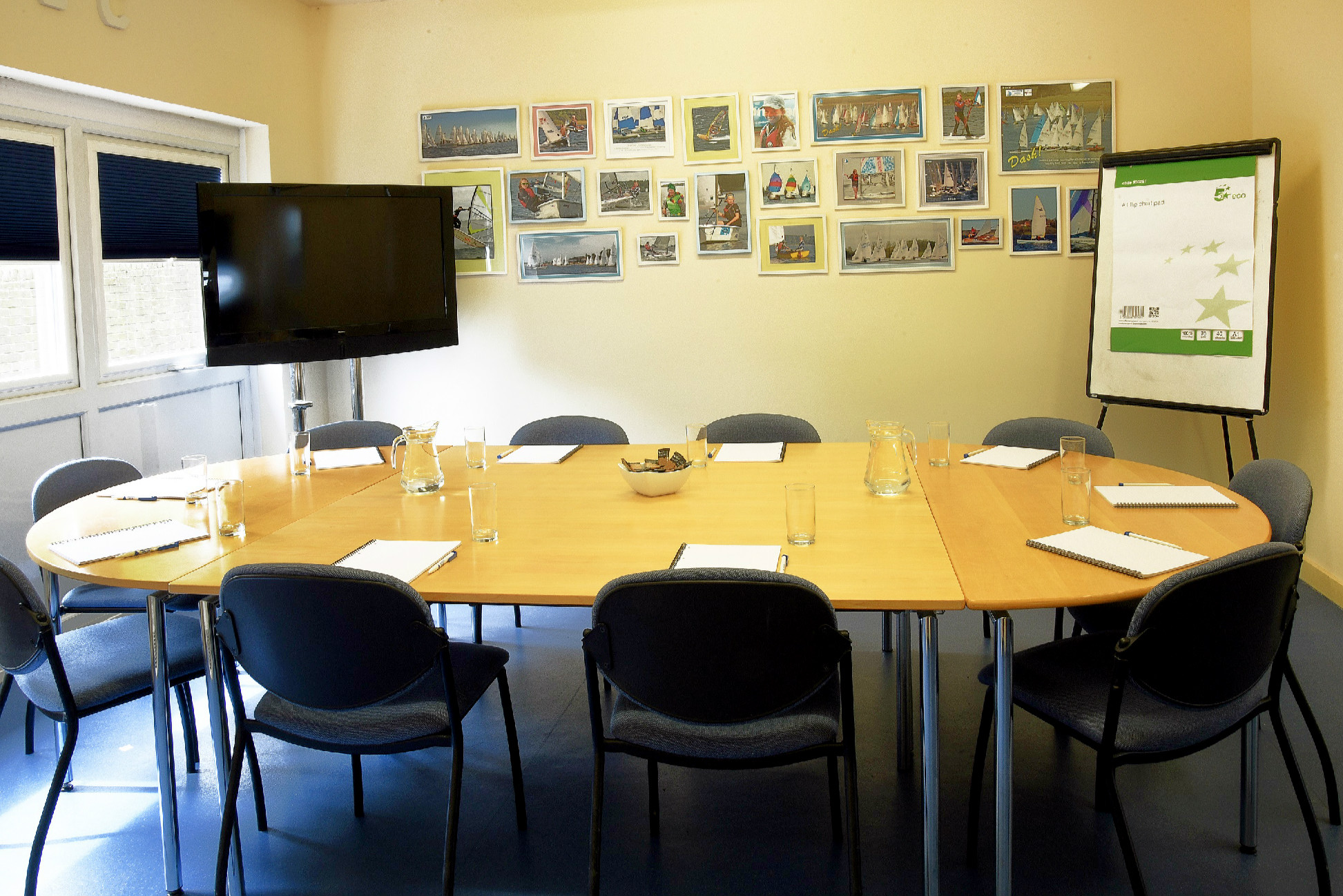 Hensborough Room with oval table, ideal for meetings and collaboration events.