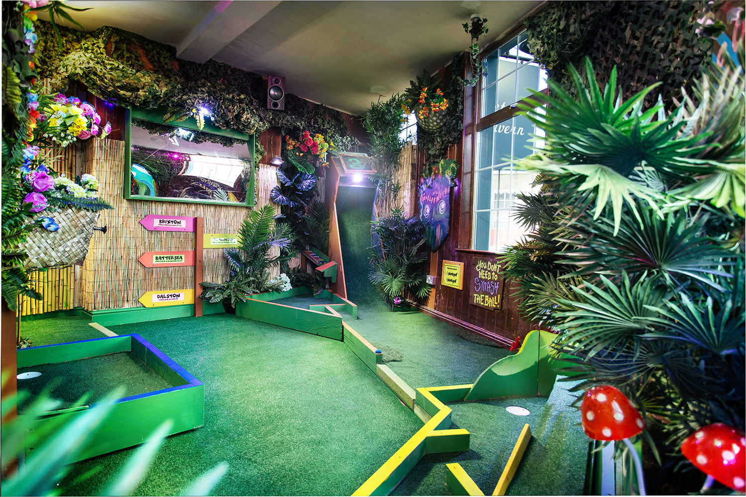 Vibrant mini-golf setup at The Arcade, ideal for corporate events and team-building activities.