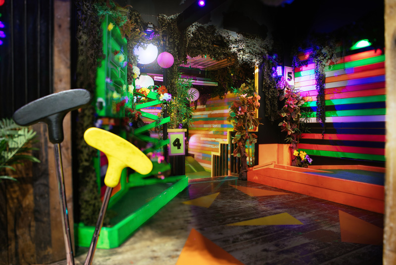 Vibrant mini-golf venue at Plonk Crazy Golf, perfect for team-building events.
