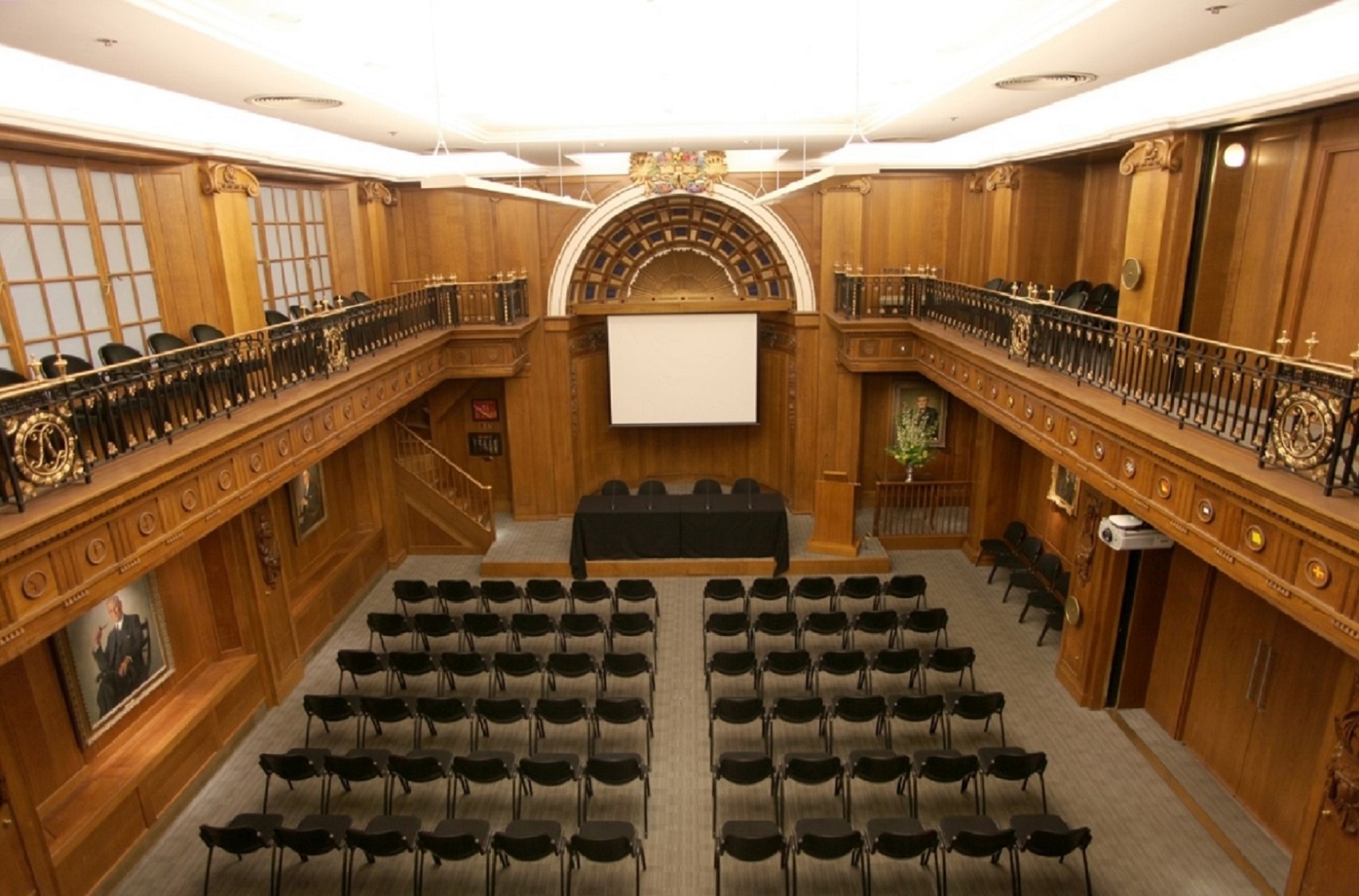 Old Library in Lloyd's: elegant wood-paneled conference venue with natural light.