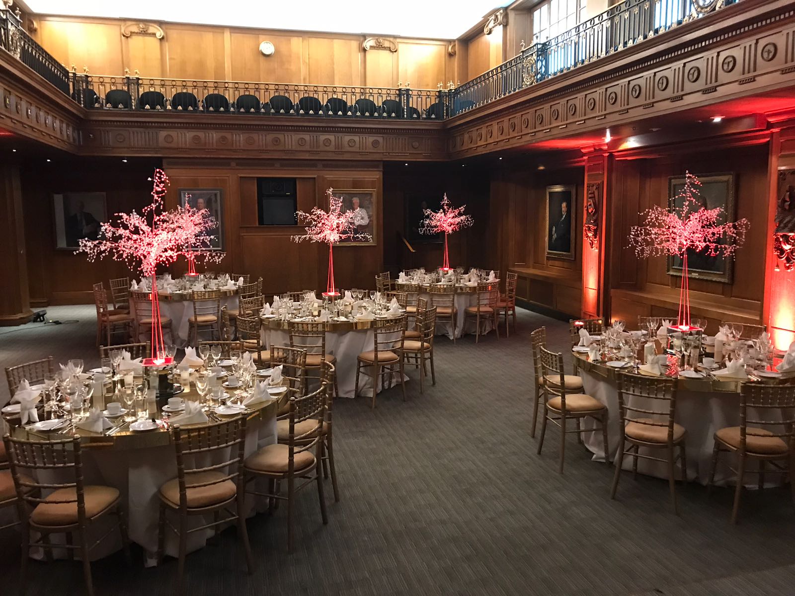 Elegant event space in Old Library, Lloyd's with round tables for formal dinners.