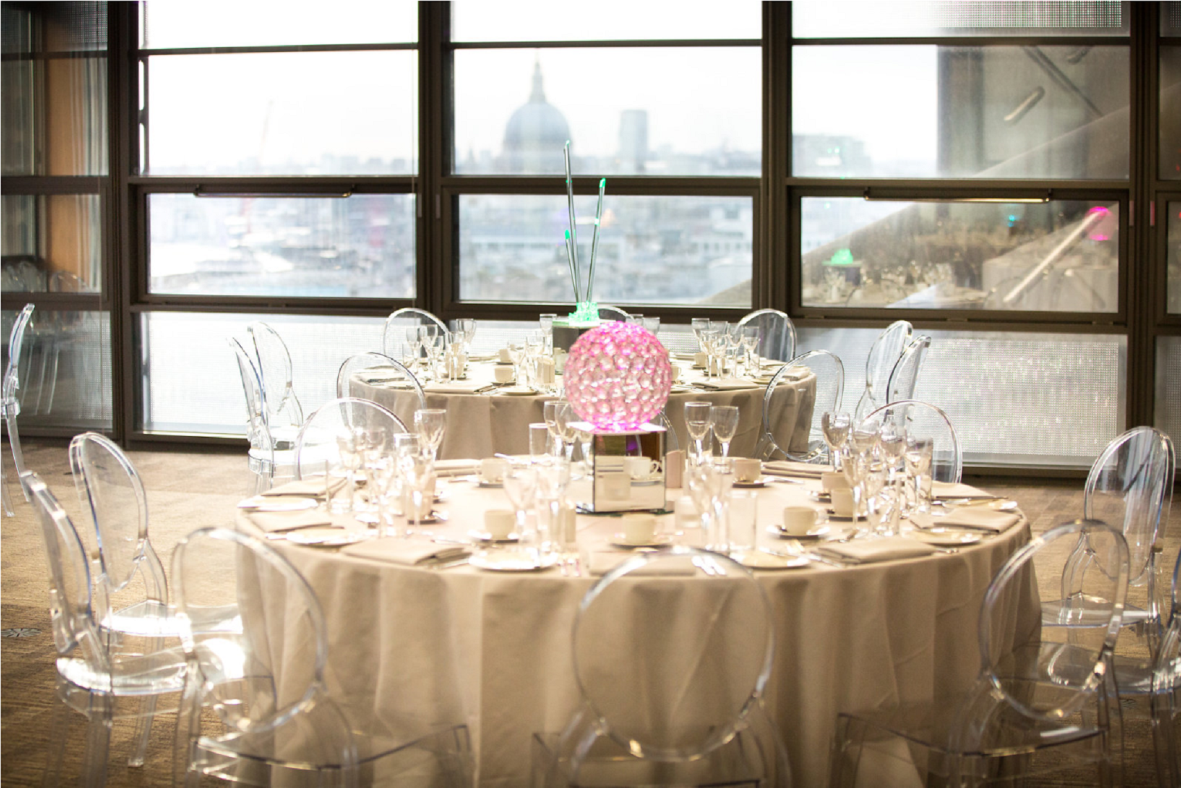 Elegant dining setup in The London Rooms, perfect for upscale events and gatherings.
