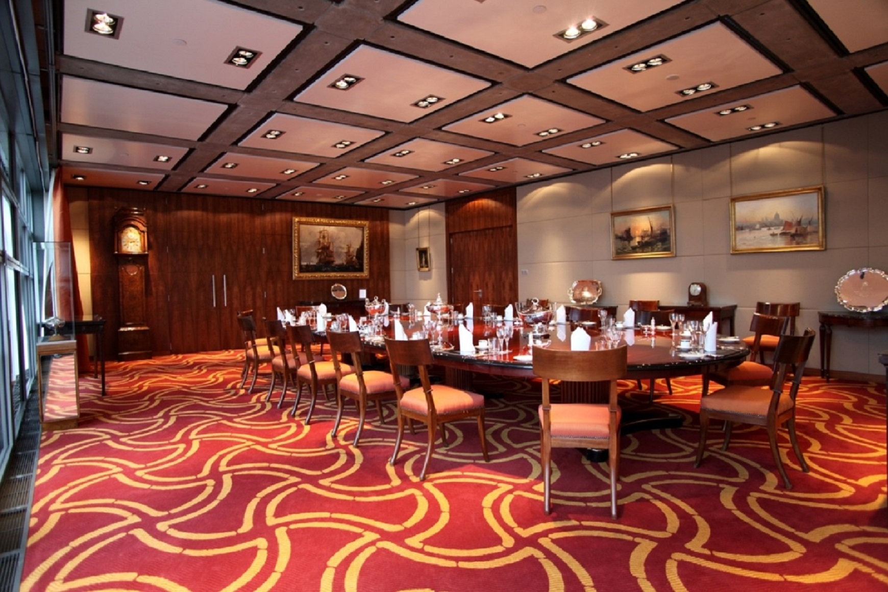 Sophisticated Boston Room at Lloyd's with an oval table for executive meetings.