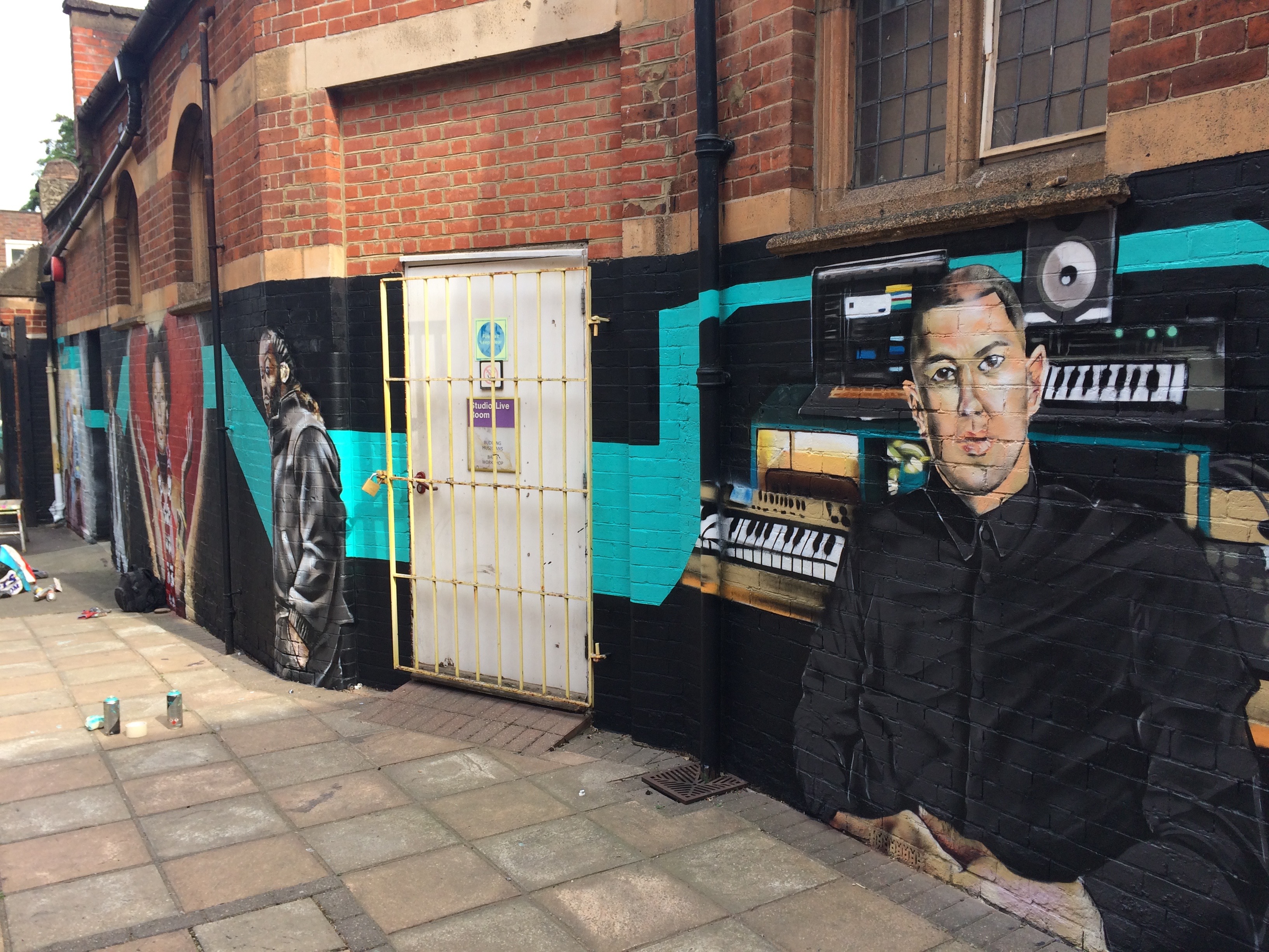 Vibrant mural at The Midi Music Company courtyard, perfect for creative events.
