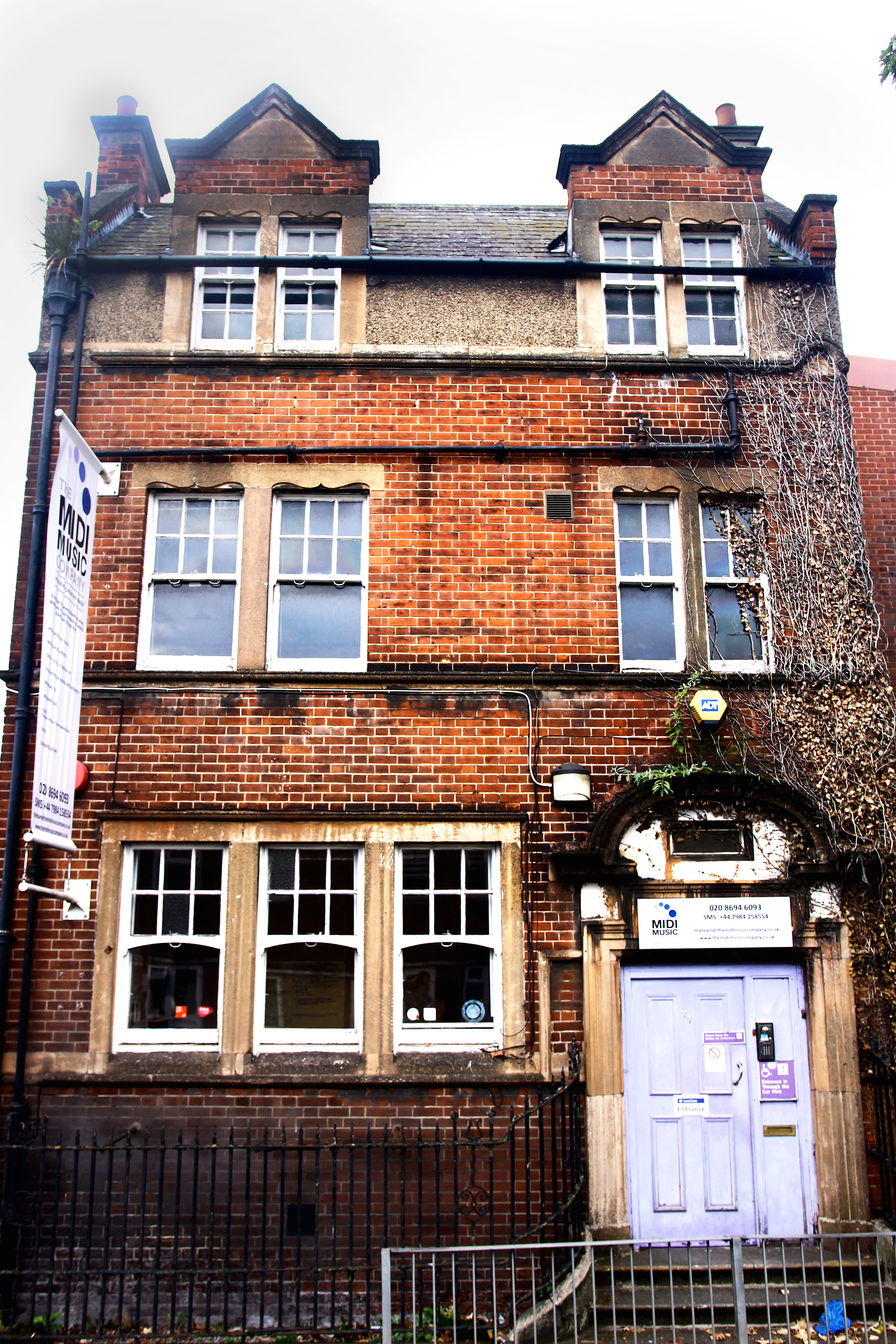 Historic brick and stone venue for intimate meetings and events with outdoor spaces.