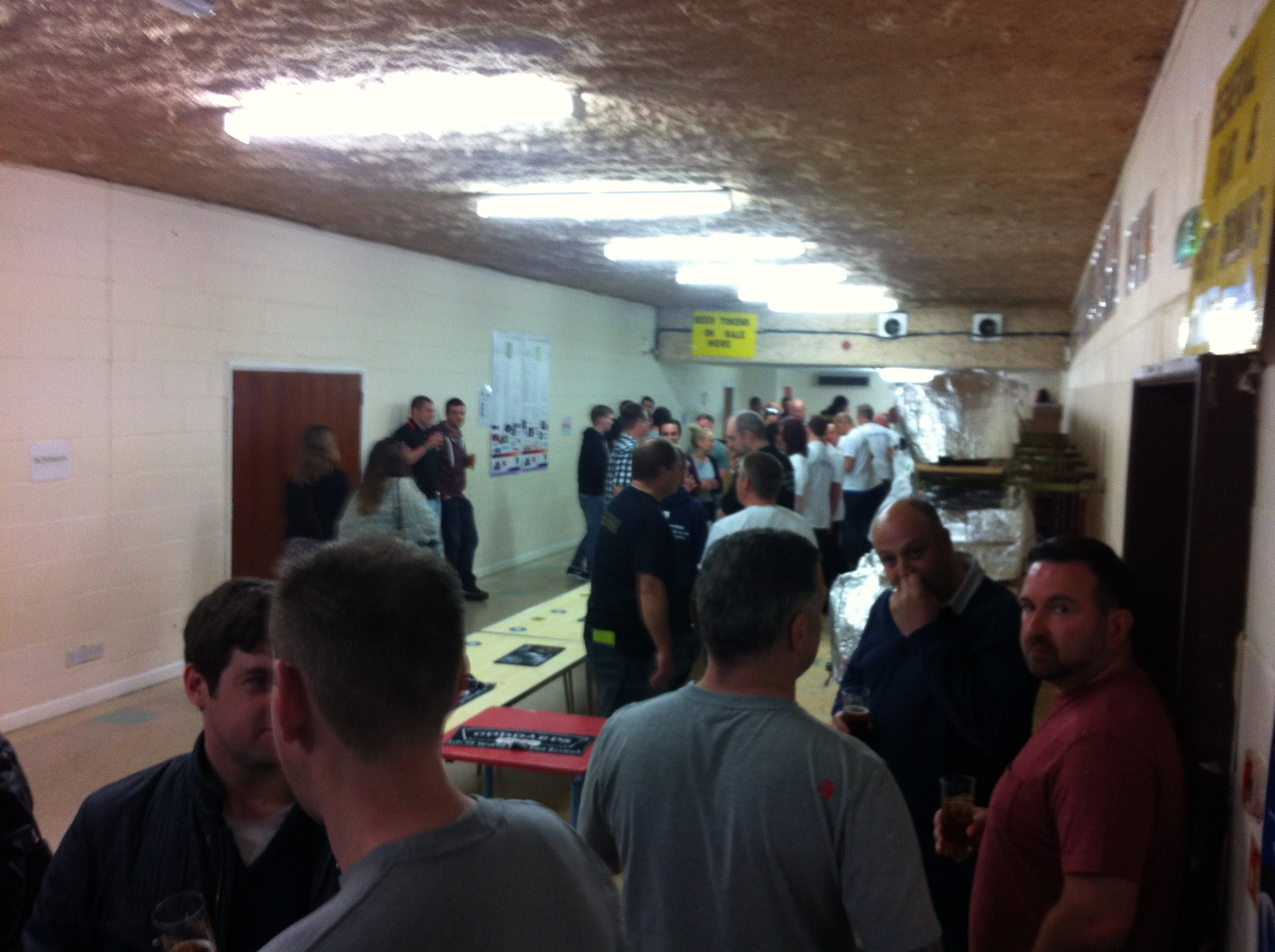 Long Room at Wickham Community Centre, bustling networking event with attendees mingling.