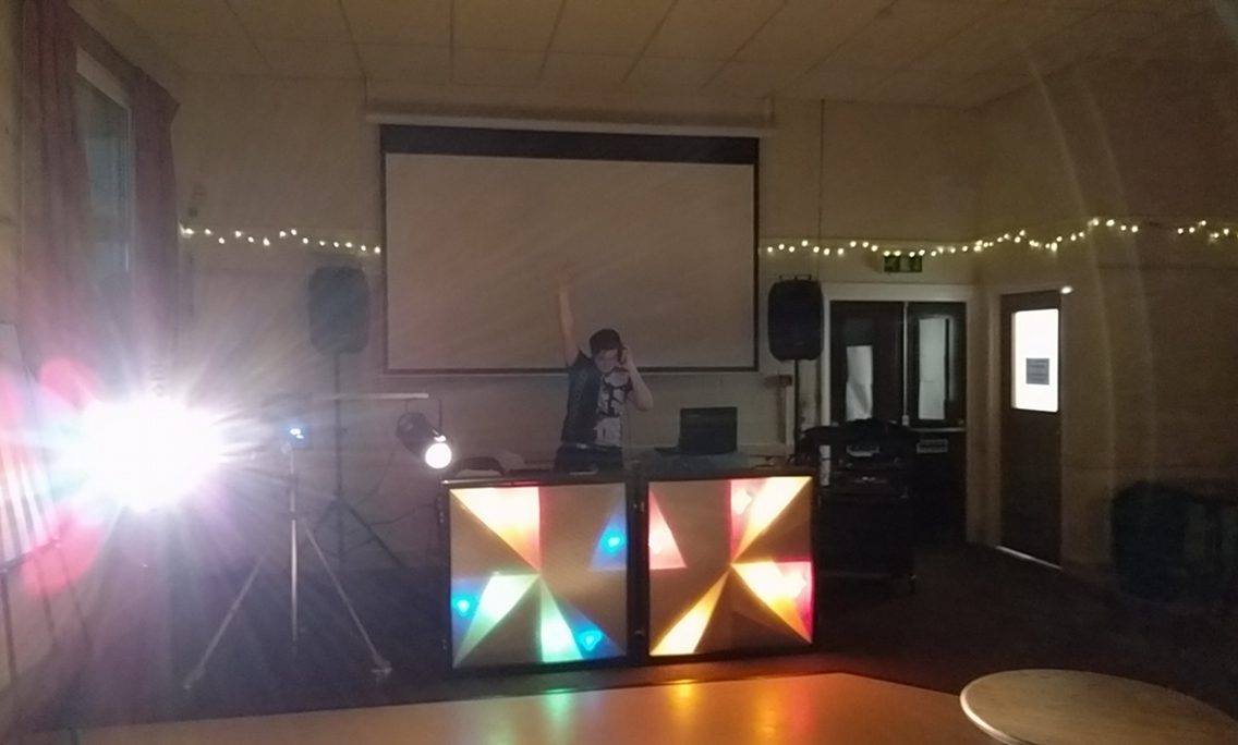 DJ setup in Woodford Suite, colorful LED lights for lively parties and corporate events.