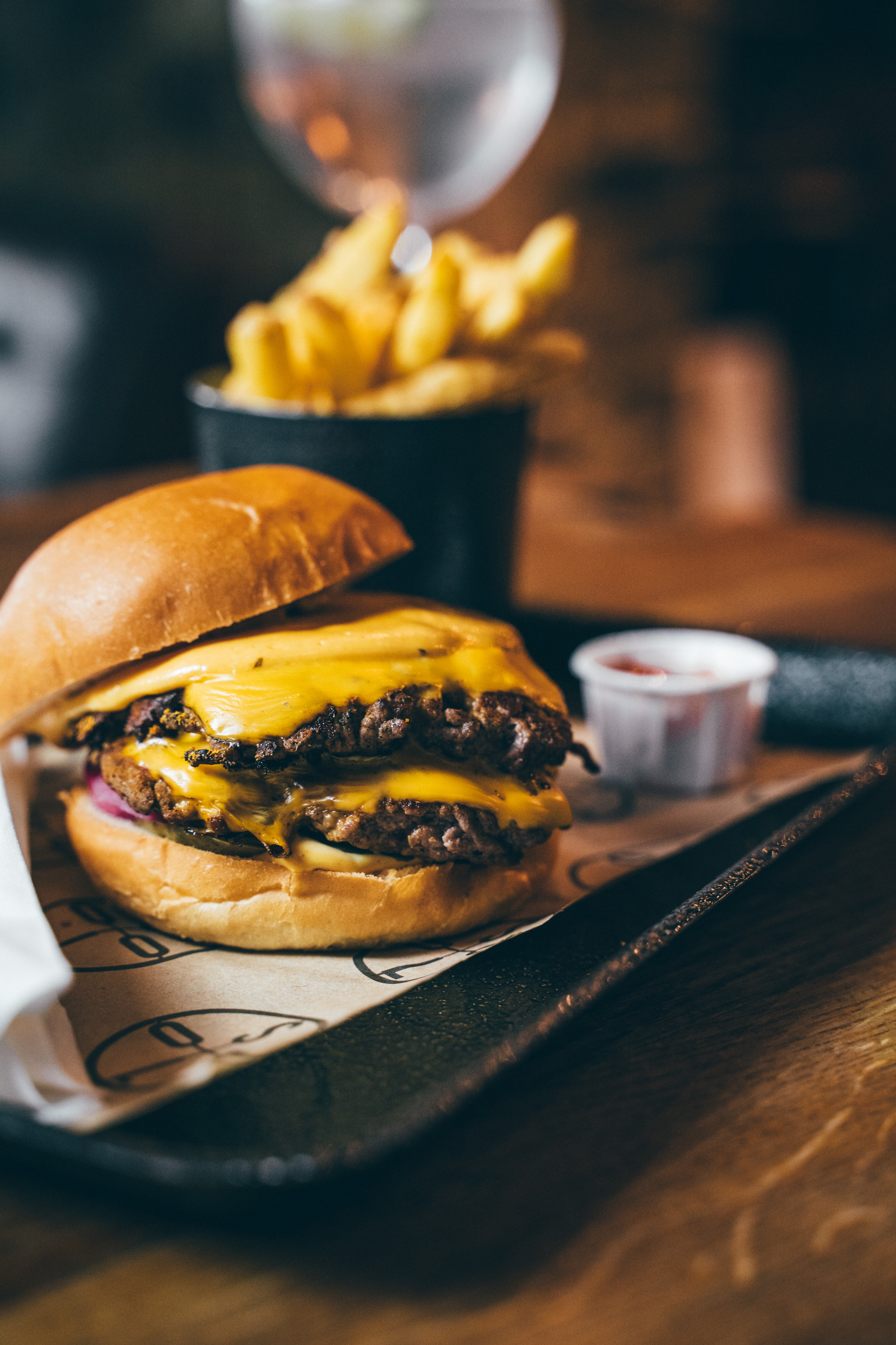 Double cheeseburger at Oslo Hackney, perfect for casual event catering and networking.