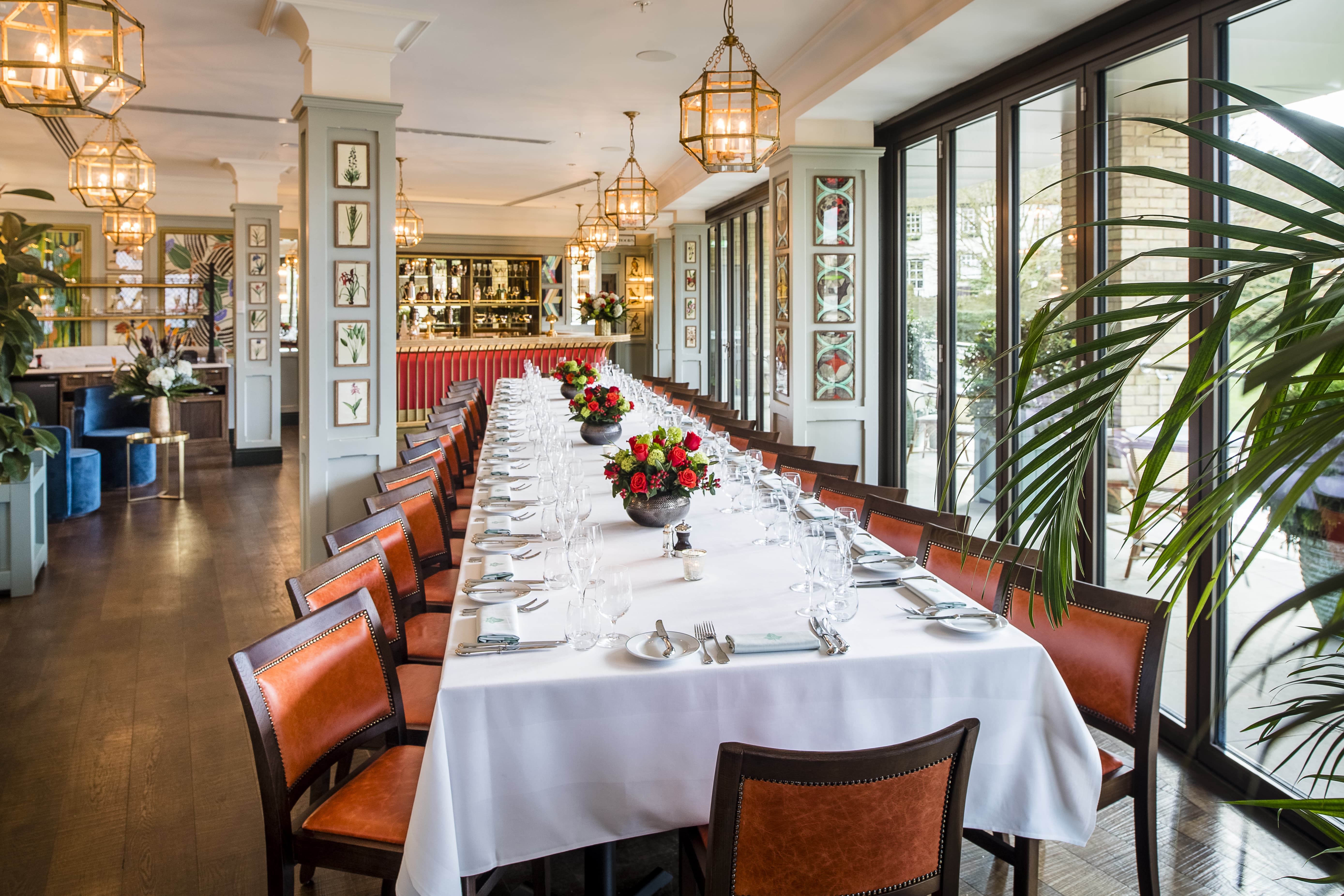 Elegant dining setup in The Looking Glass Room, ideal for corporate events and gatherings.
