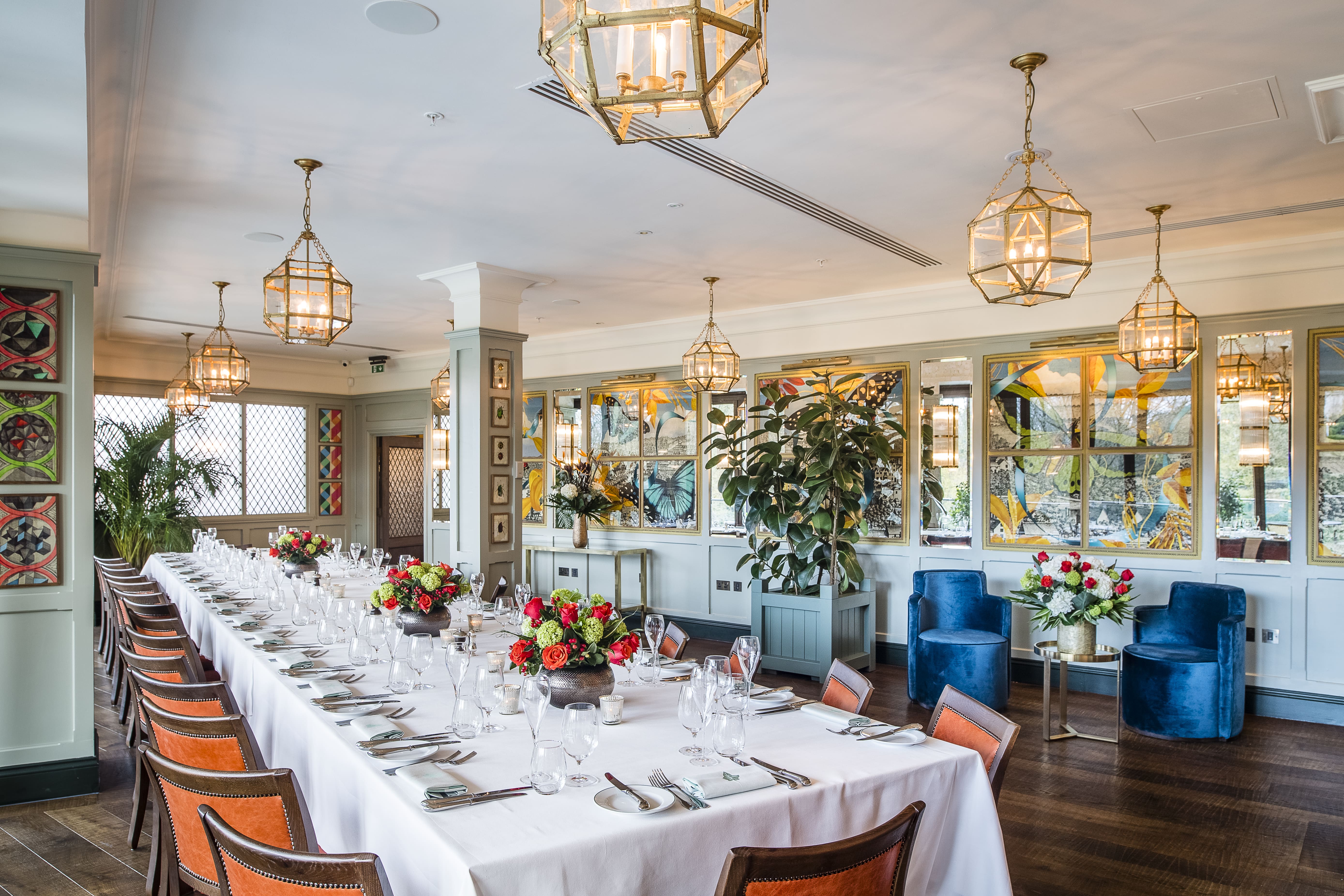 Elegant dining setup in The Looking Glass Room, perfect for corporate events and gatherings.
