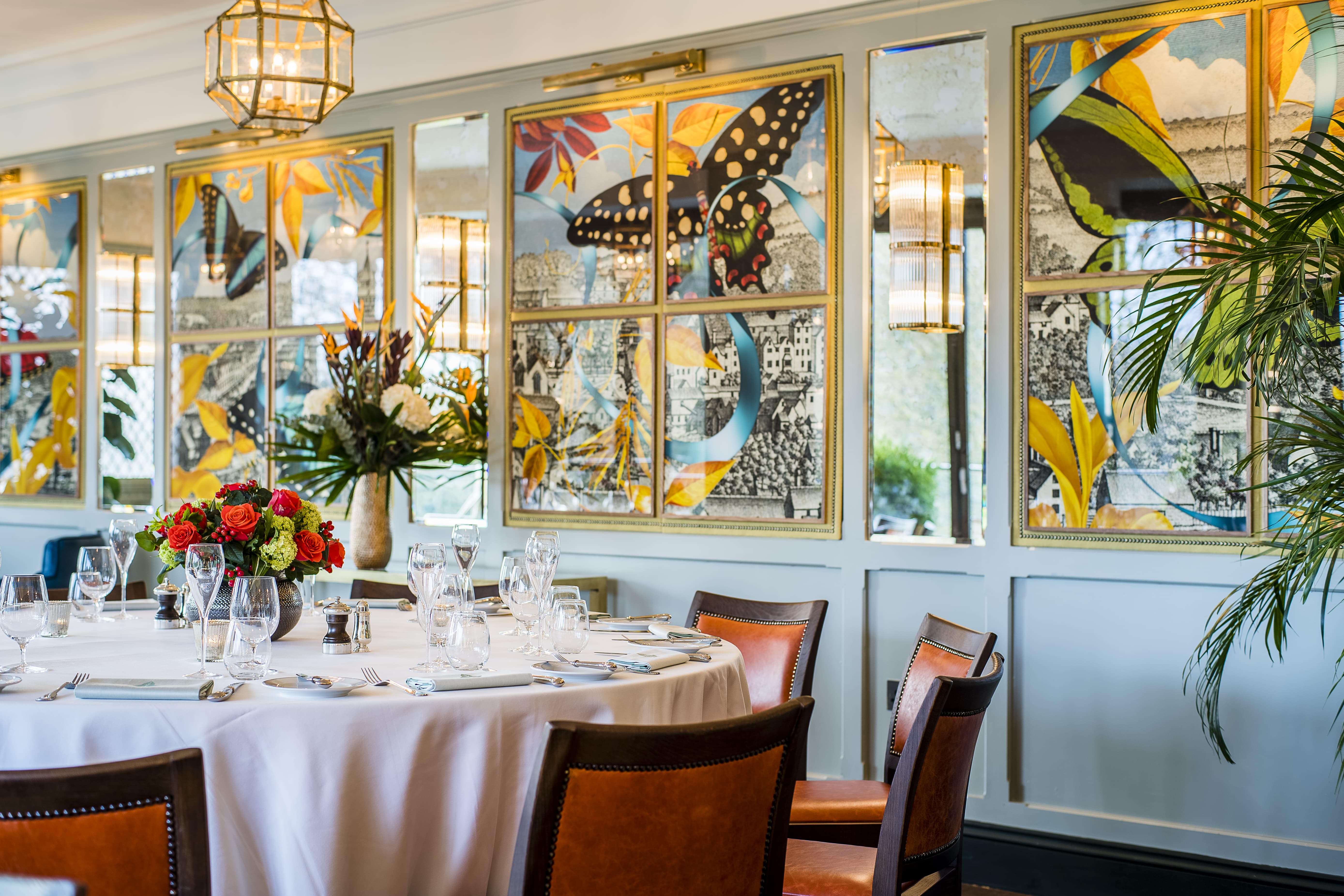 Elegant dining table in The Looking Glass Room, perfect for upscale events and gatherings.