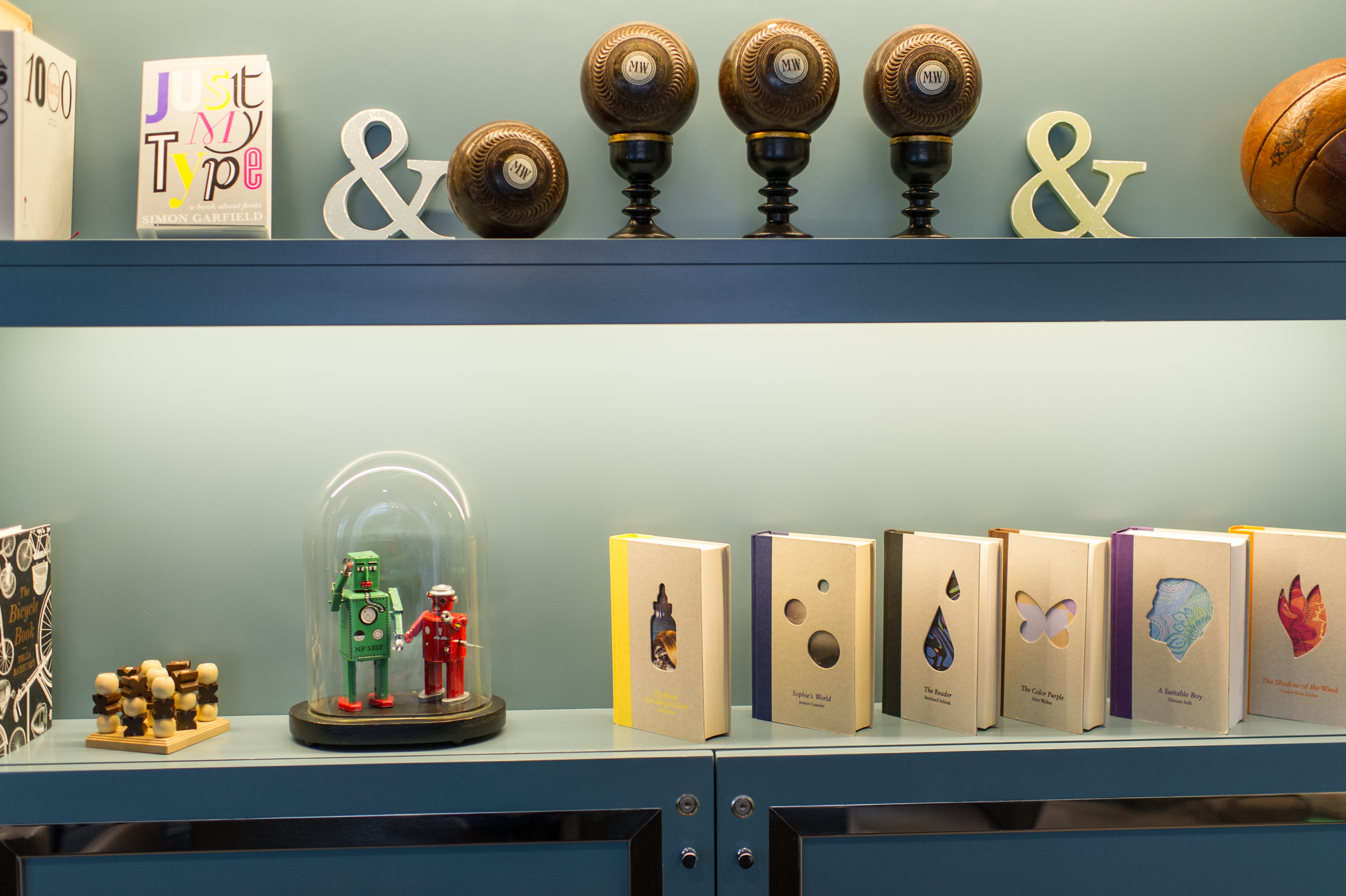 The Ampersand Hotel's Games Room shelf with playful decor for meetings and events.