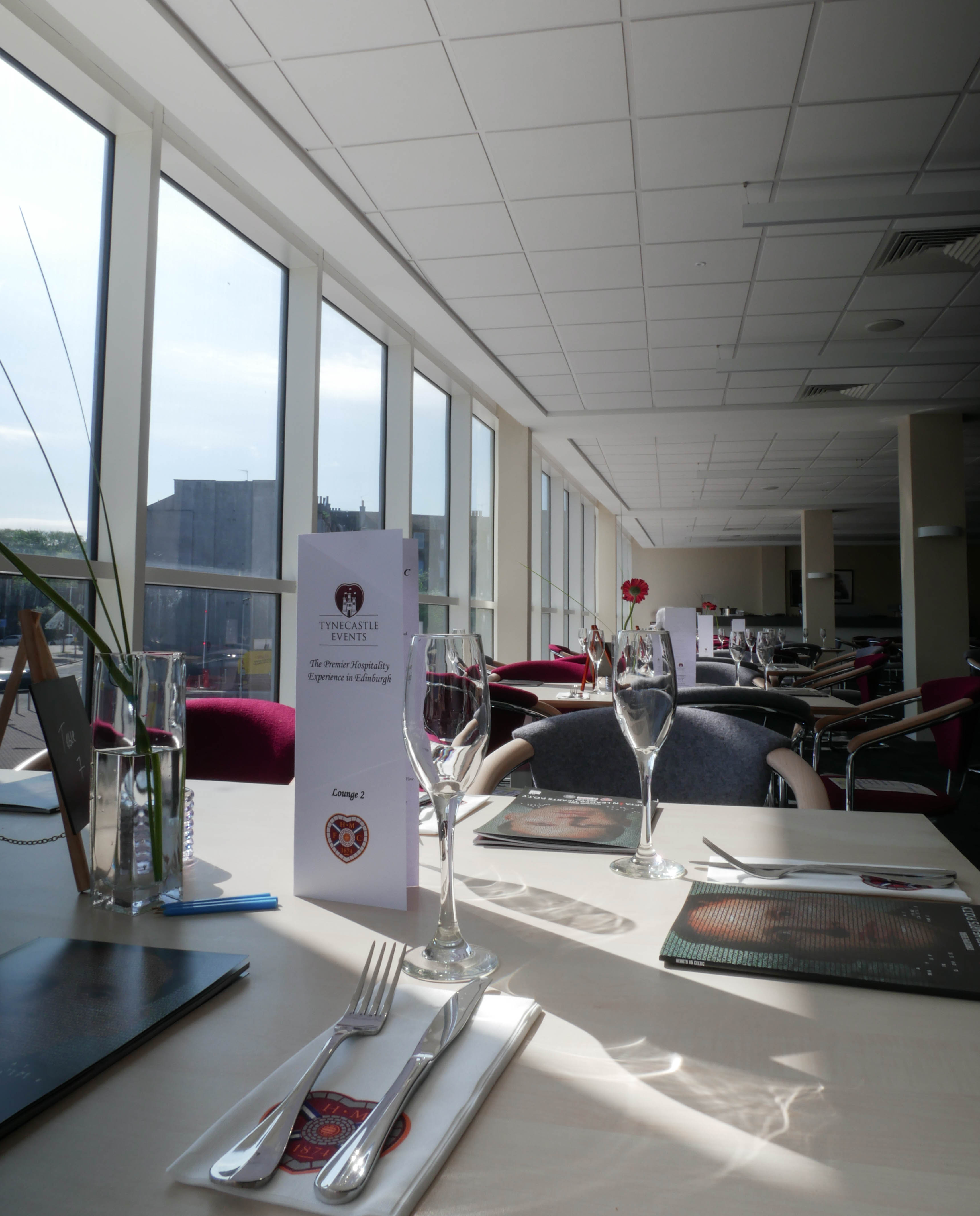 Elegant event space in Tynecastle Park with modern decor for corporate gatherings.