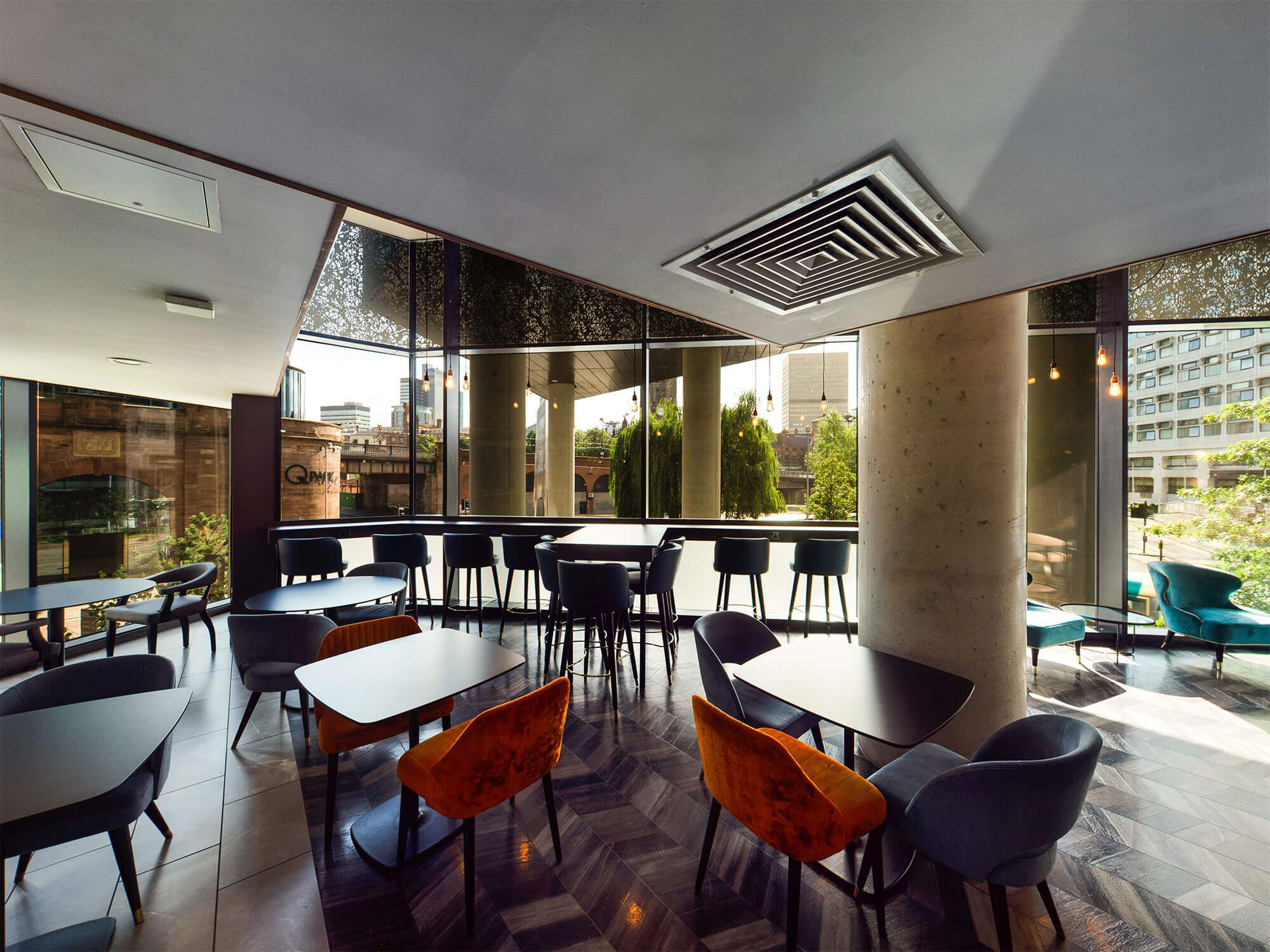 Modern Embankment Lounge with large windows, ideal for networking events and meetings.