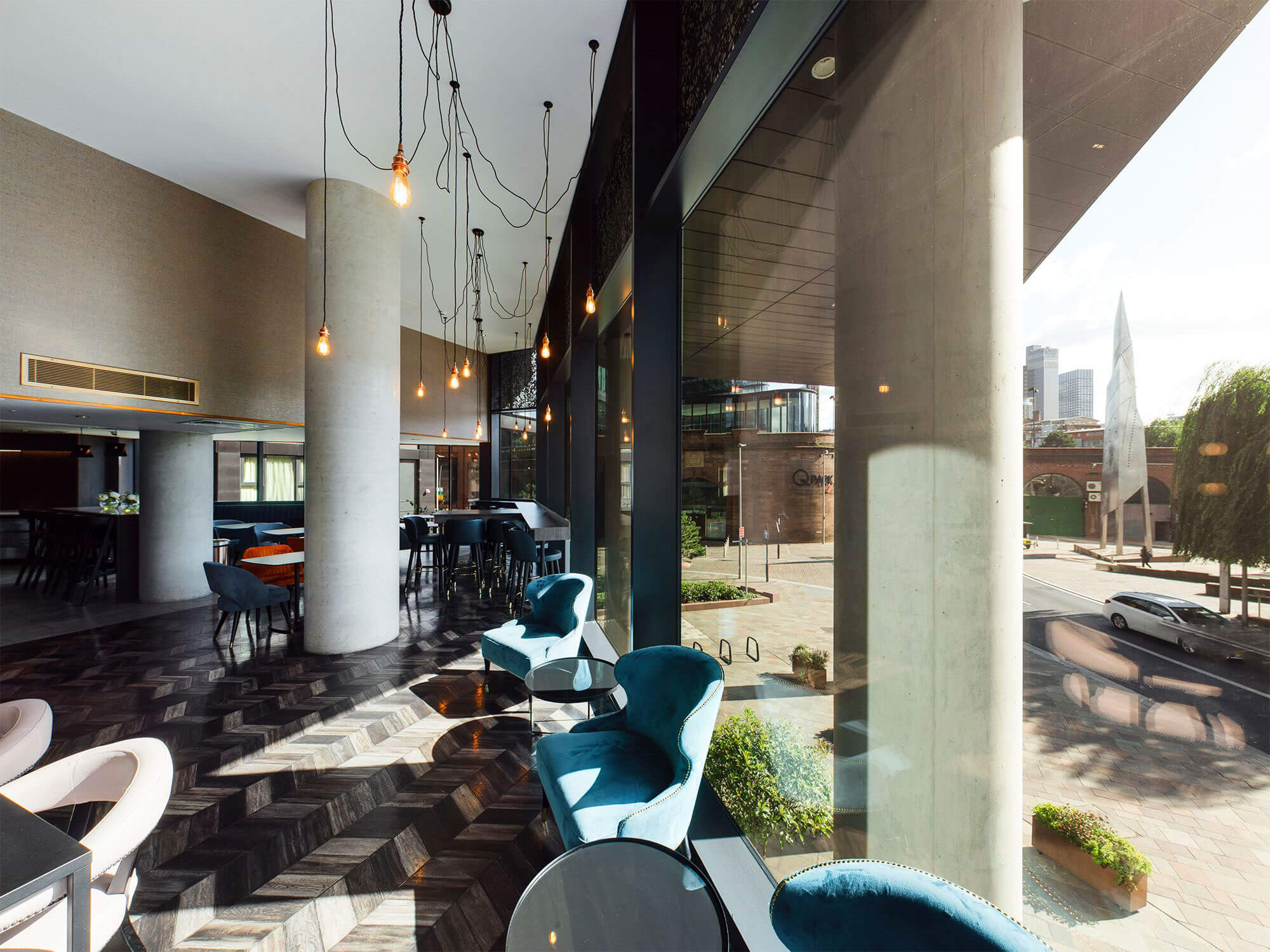 Modern Embankment Lounge with large windows, ideal for networking events and meetings.