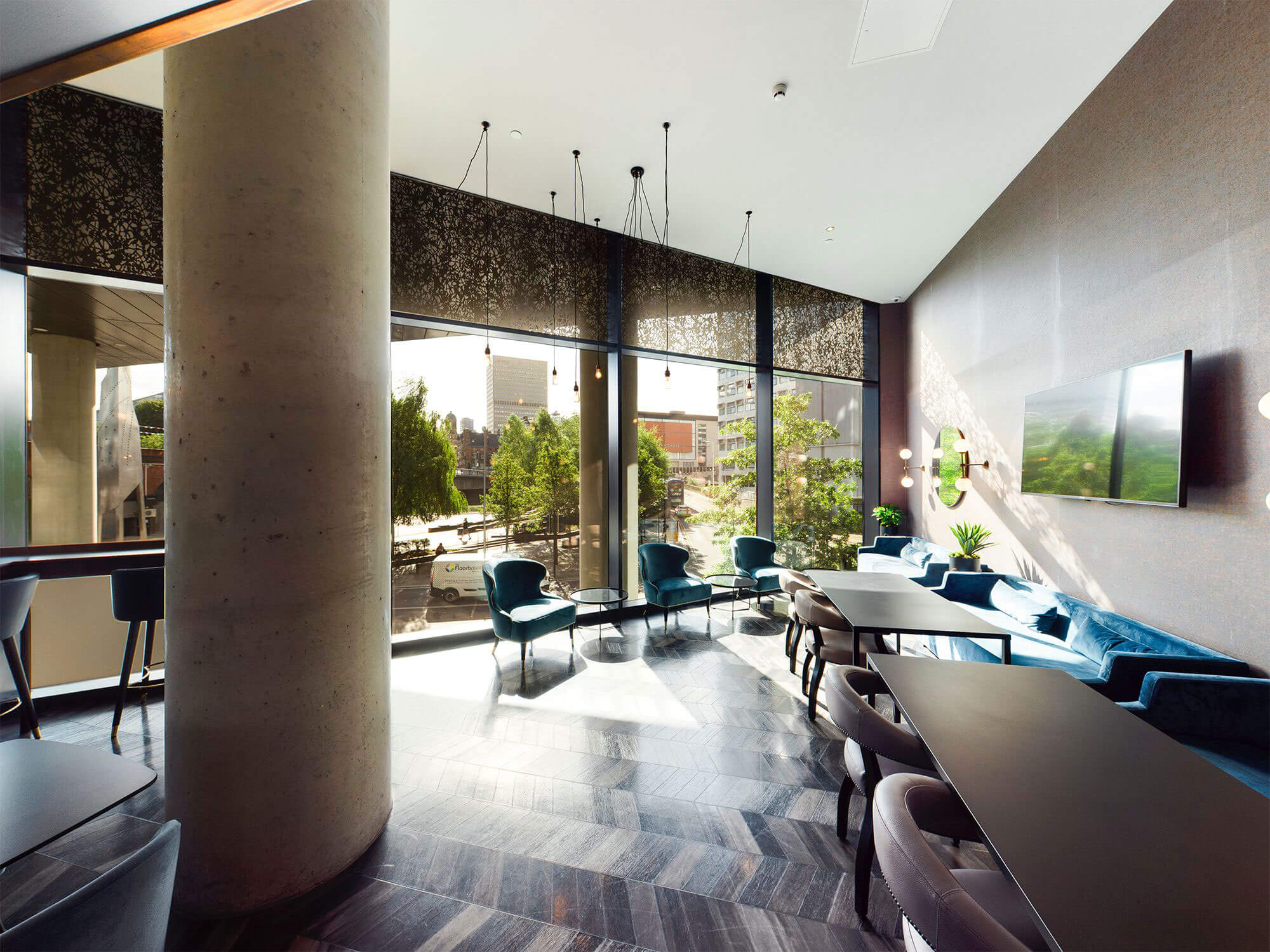 Modern meeting space with large windows at Embankment Lounge, perfect for events.