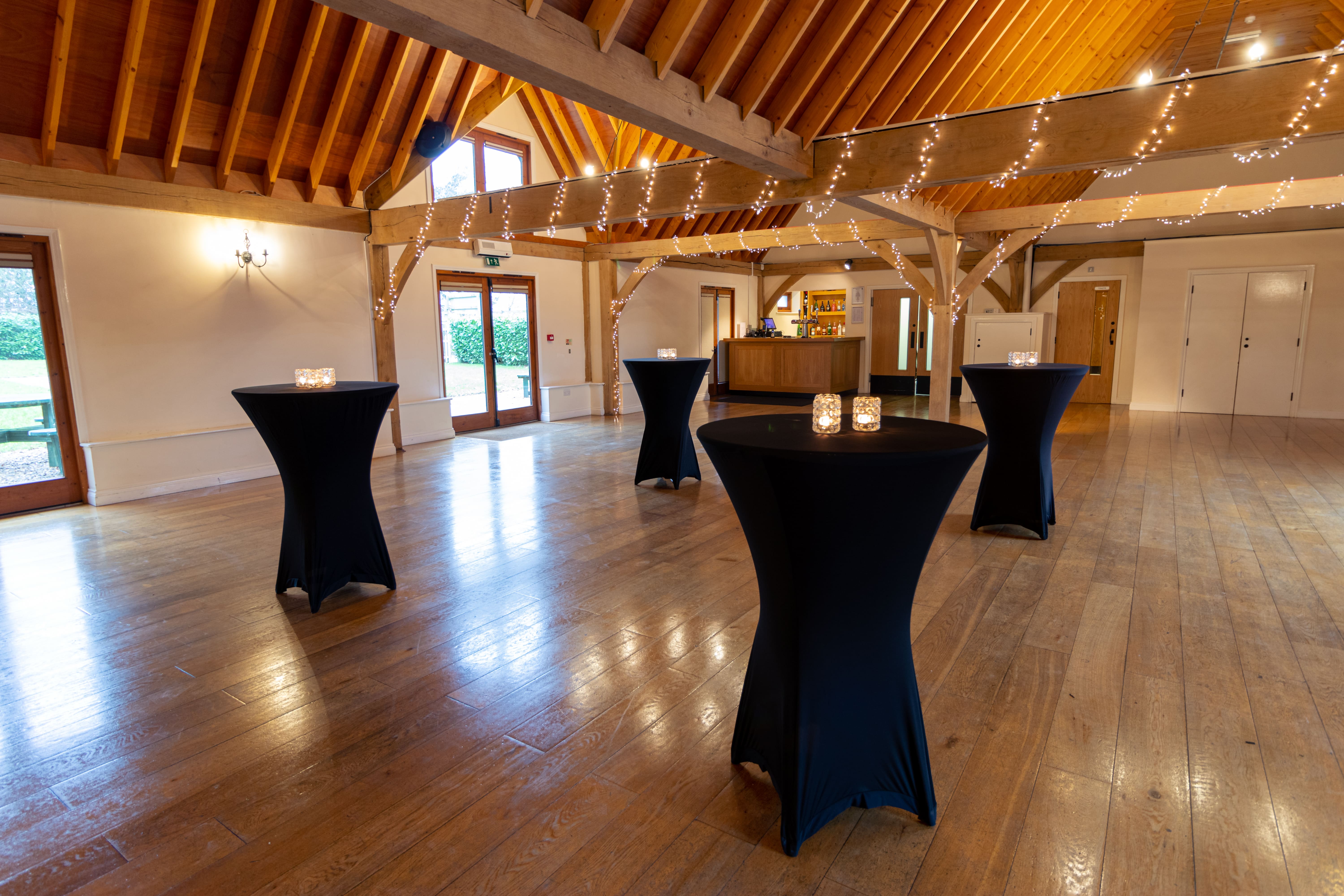 Cobbold Barn at Knebworth House: elegant wooden beams for versatile events and gatherings.