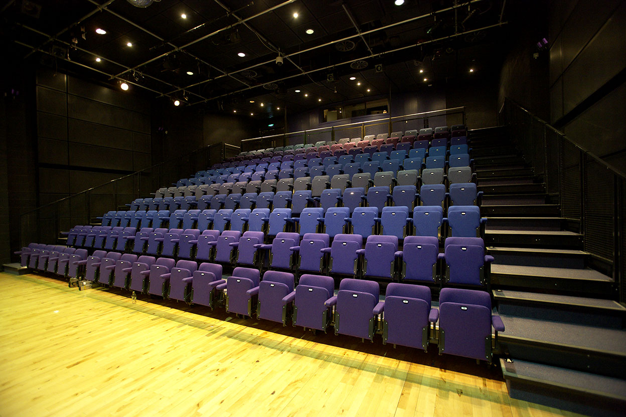 Birmingham Hippodrome auditorium with purple tiered seating for events and performances
