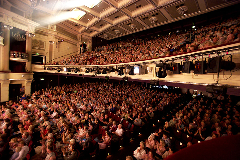 Packed Birmingham Hippodrome auditorium with tiered seating for impactful events.
