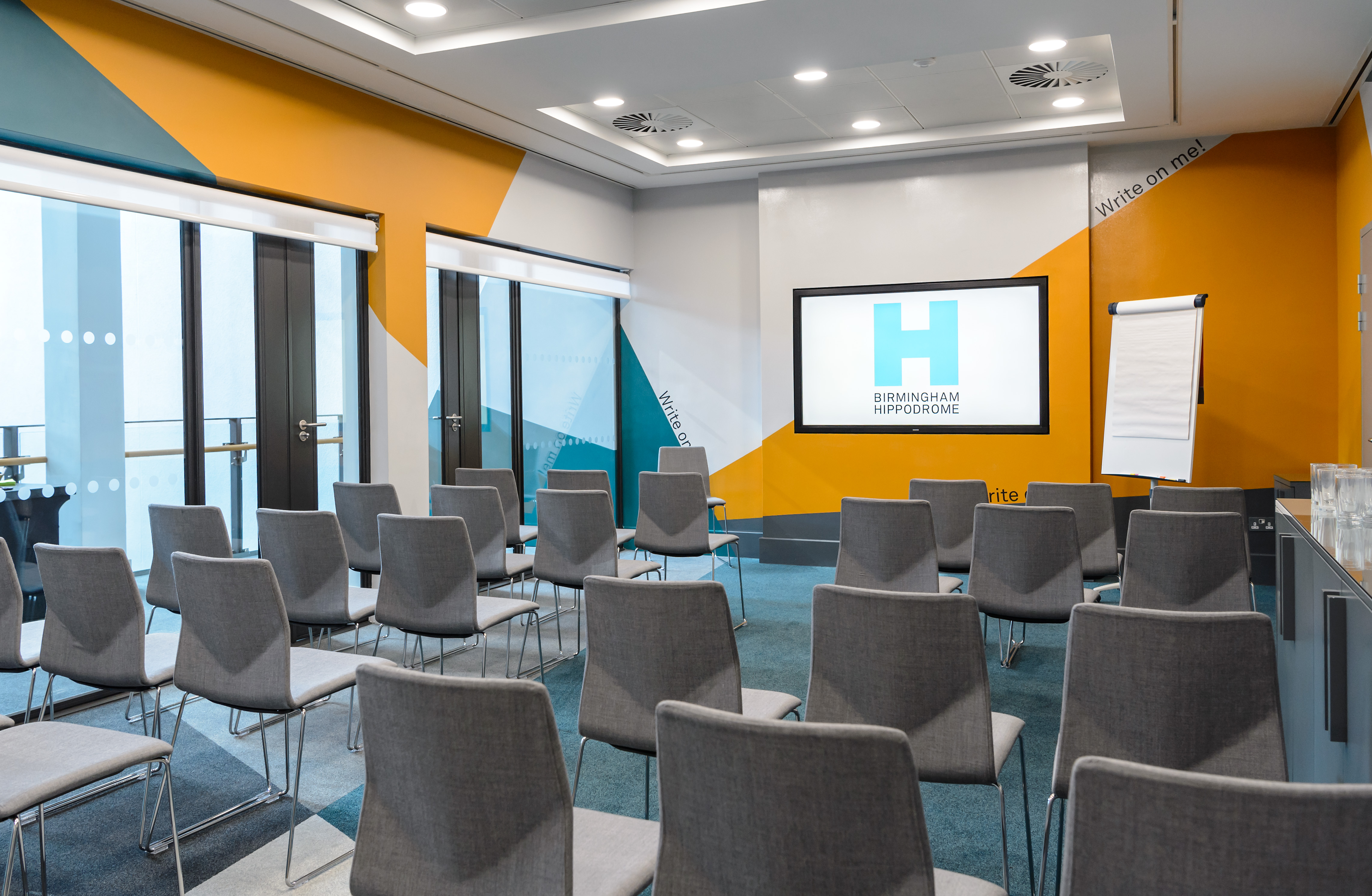 Modern conference room in Lloyds Room, Birmingham Hippodrome for workshops and presentations.