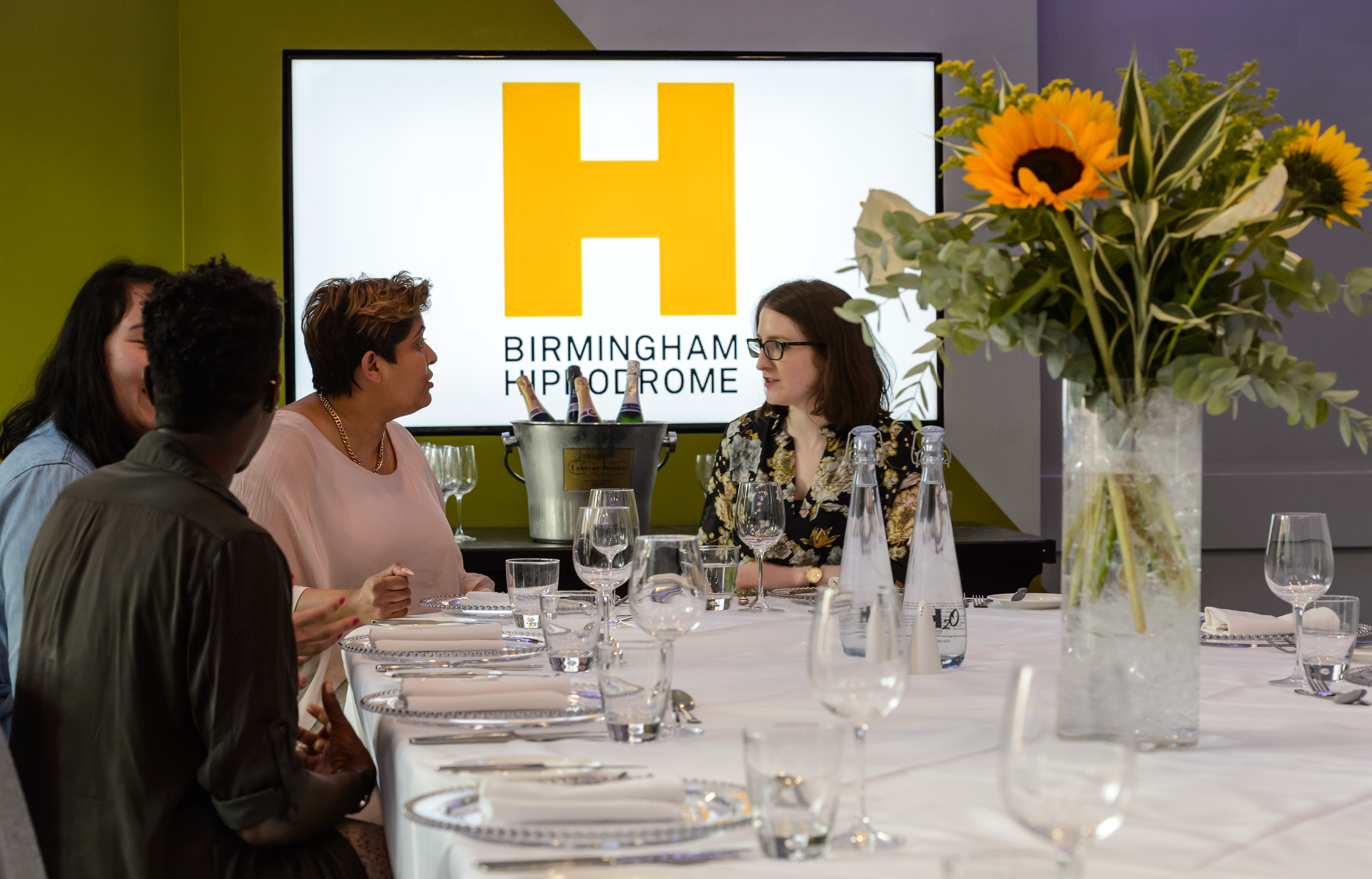 Polished meeting setup at Gowling WLG Suite, Birmingham Hippodrome for networking events.