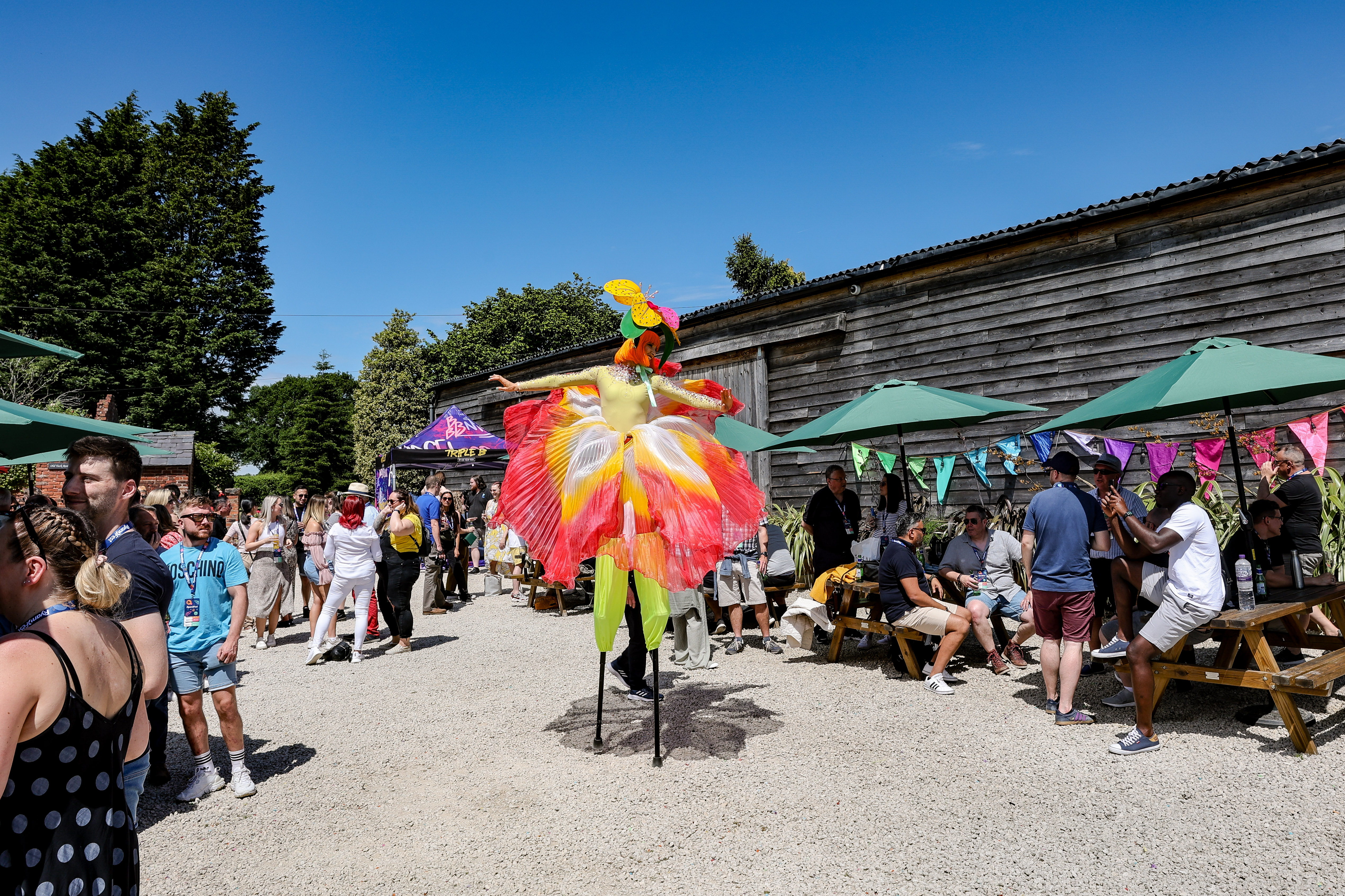 Stock Farm Barn outdoor event with colorful decor and lively atmosphere for gatherings.