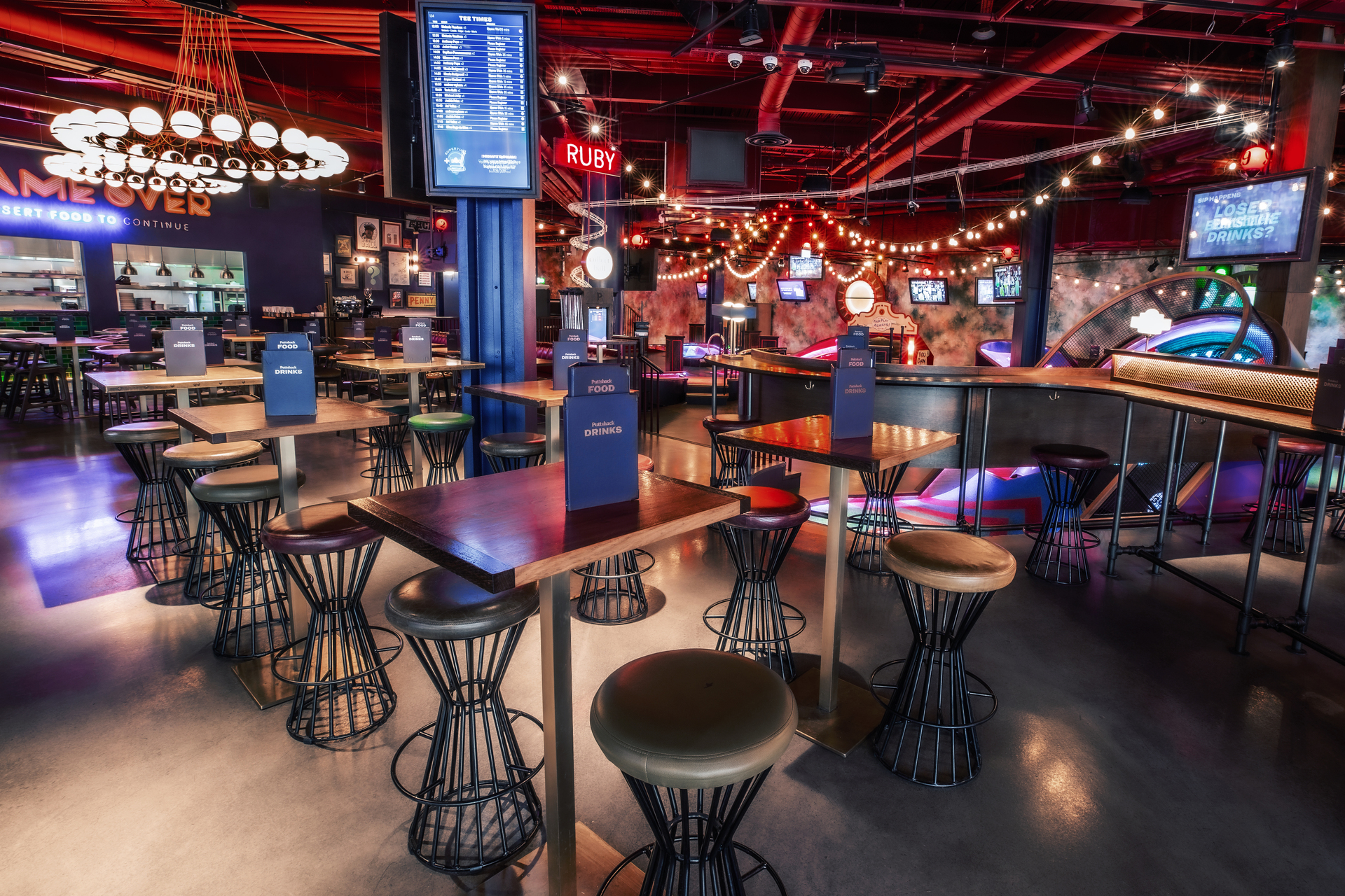Vibrant event space at Puttshack White City for networking and casual gatherings.