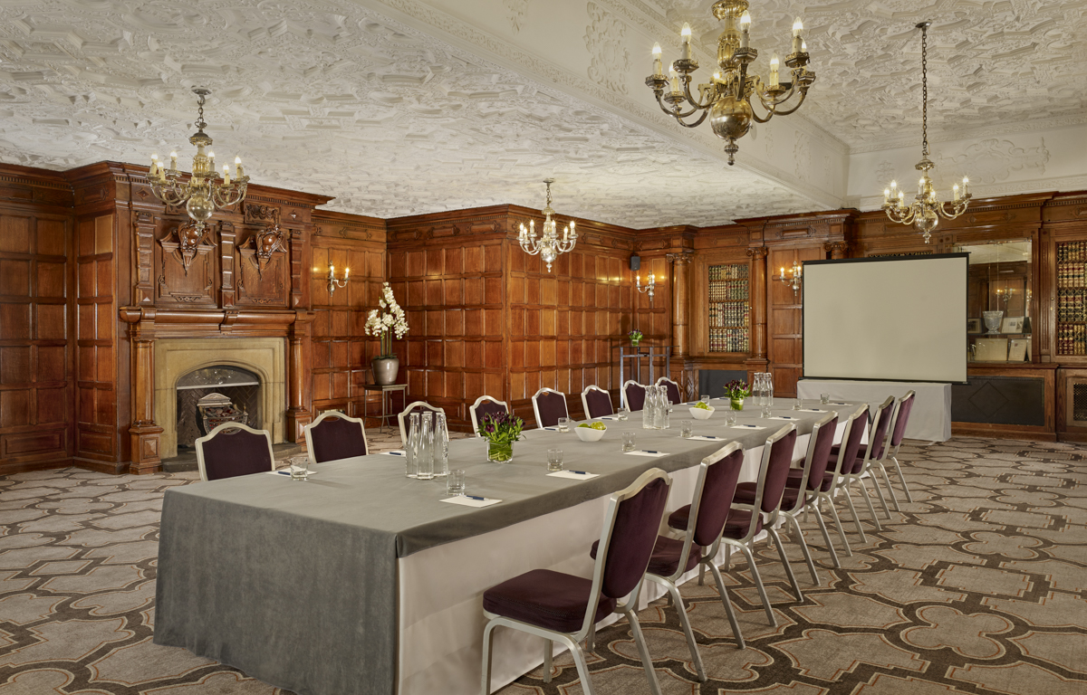 Sophisticated Oak Room at Sheraton Grand for corporate events and meetings.