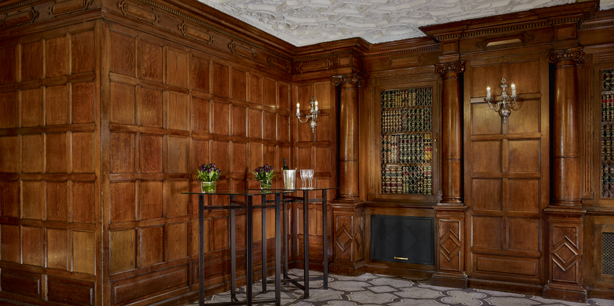 Sophisticated Oak Room at Sheraton Grand, ideal for upscale meetings and gatherings.