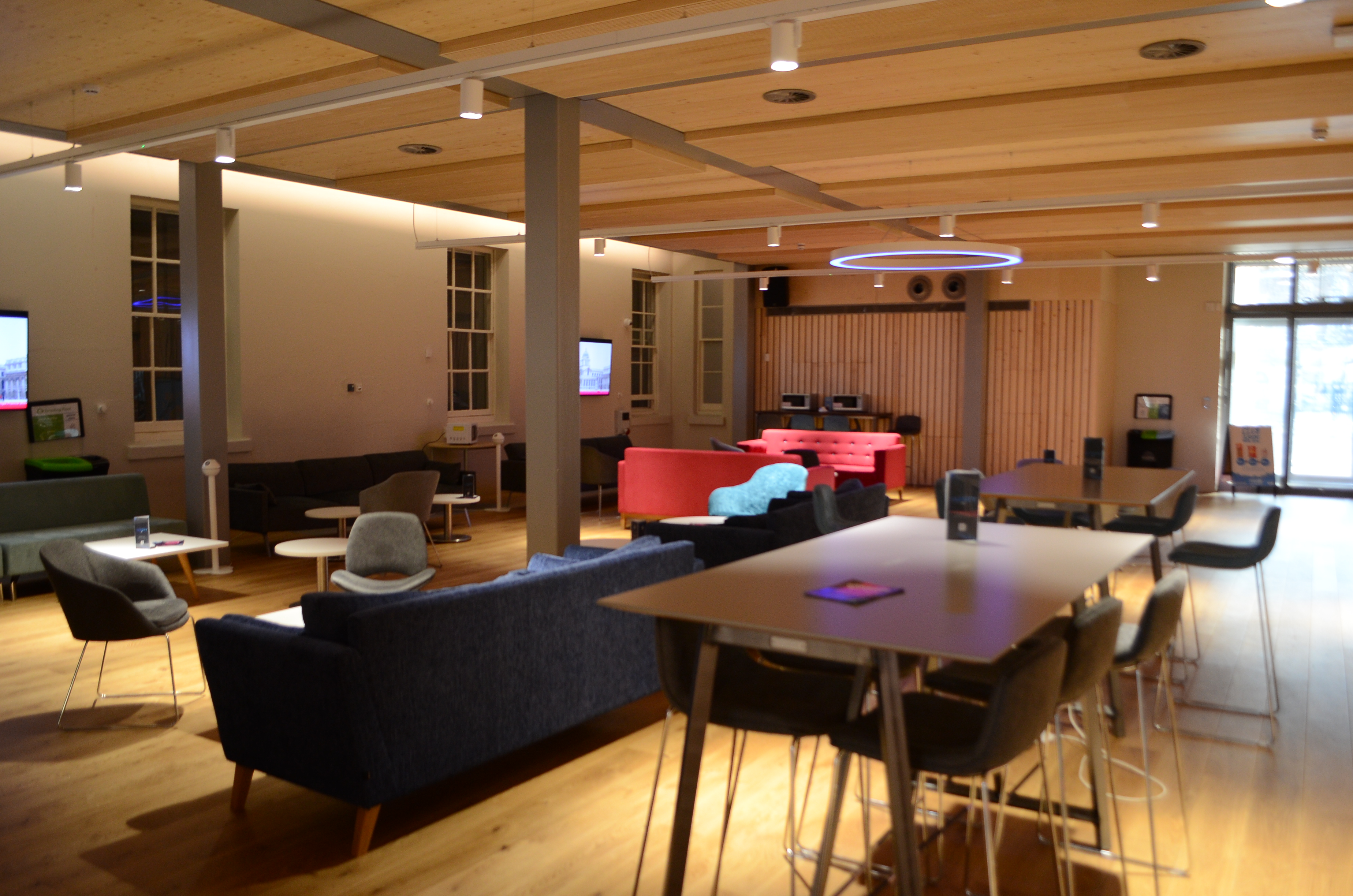 Modern event space in Dreadnought with warm lighting for workshops and networking.