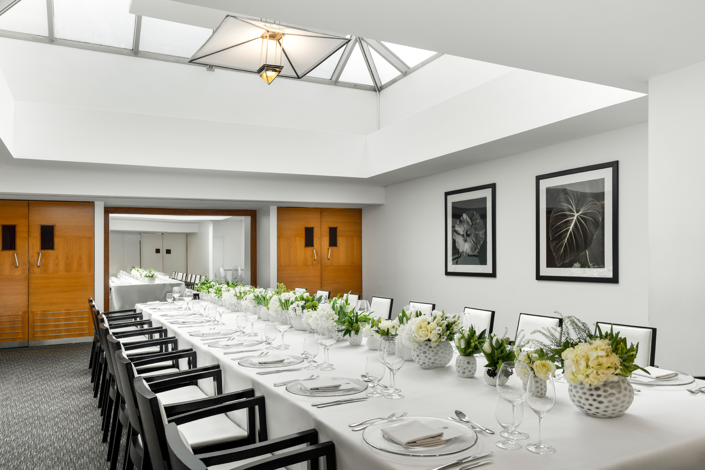 Sophisticated meeting space in COMO Metropolitan London with elegant table setup for corporate events.