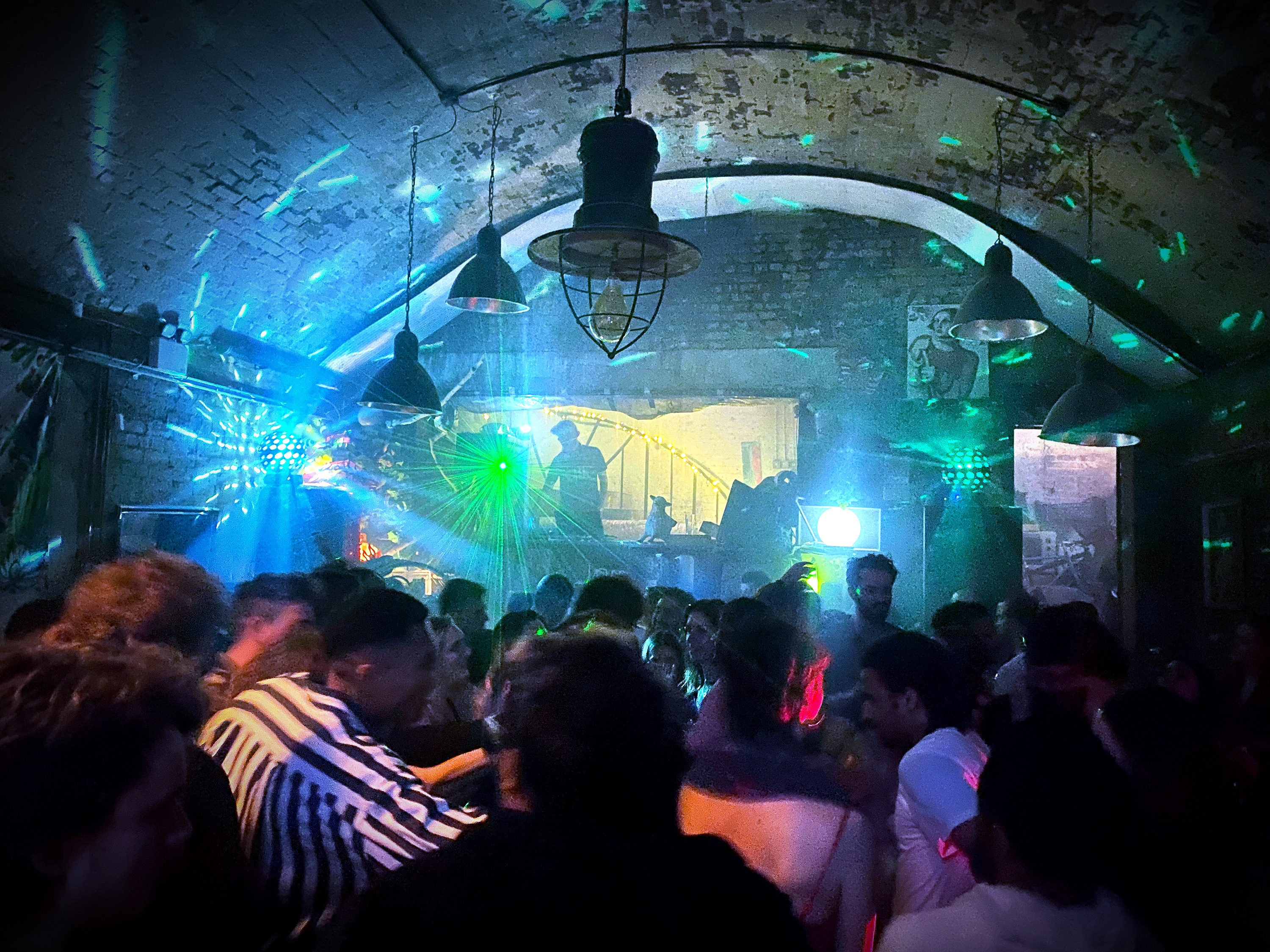 Vibrant event space in Loveshack with dynamic lighting for parties and social gatherings.